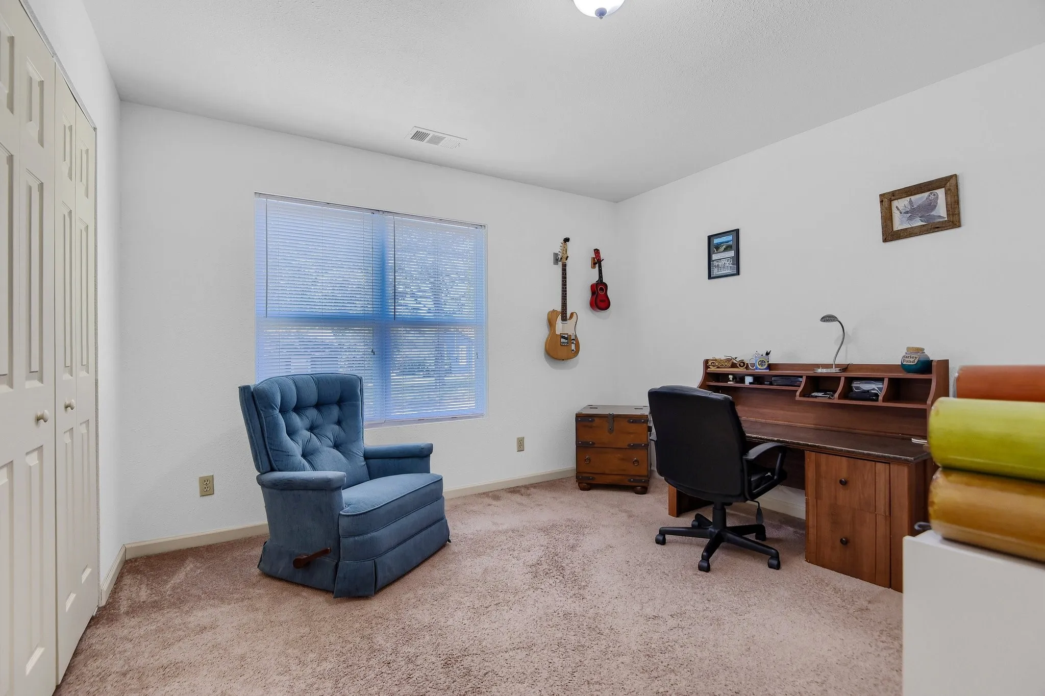 Office area with light colored carpet