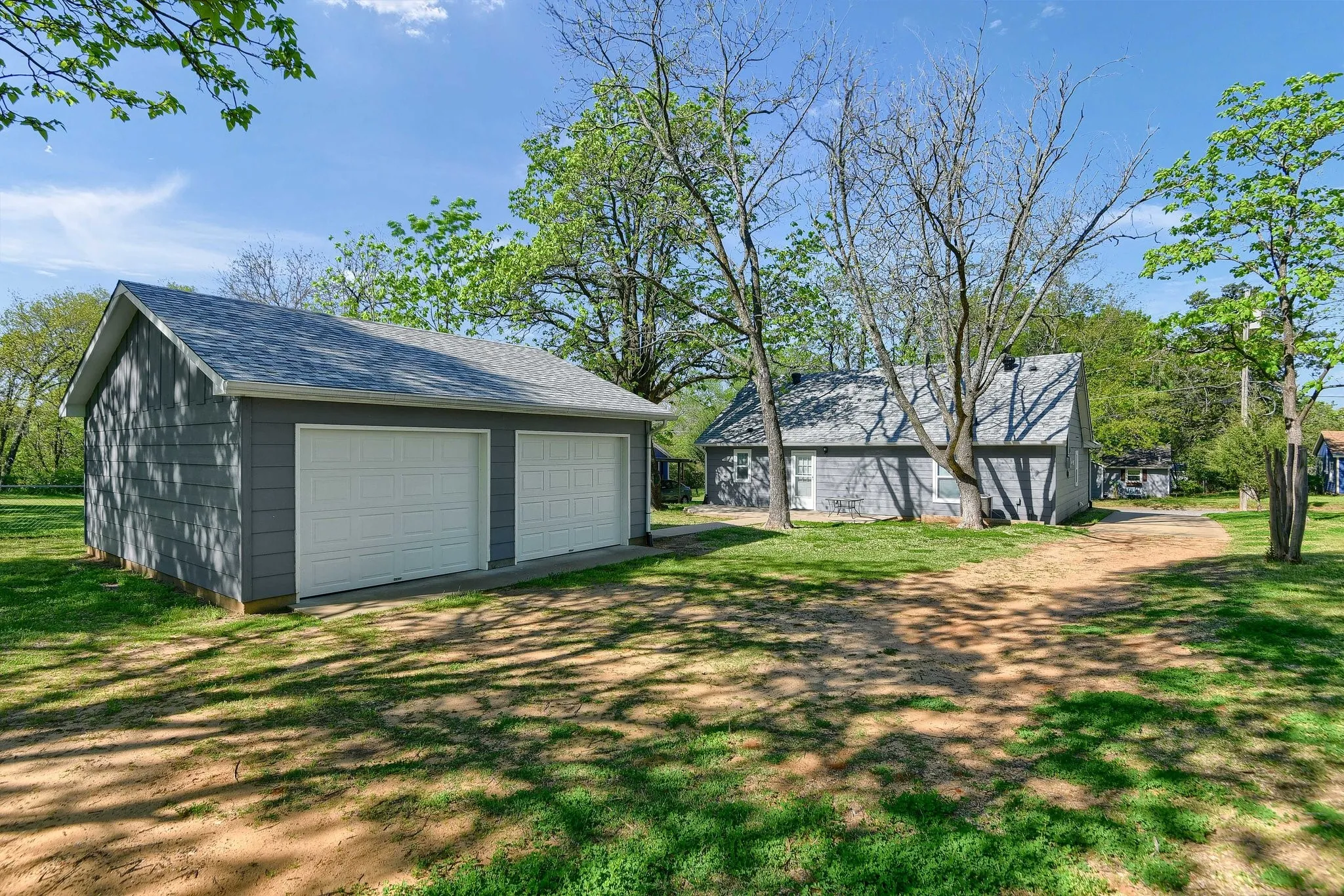 Garage with a lawn