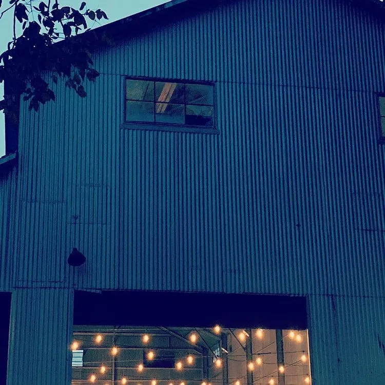 View of property exterior at twilight