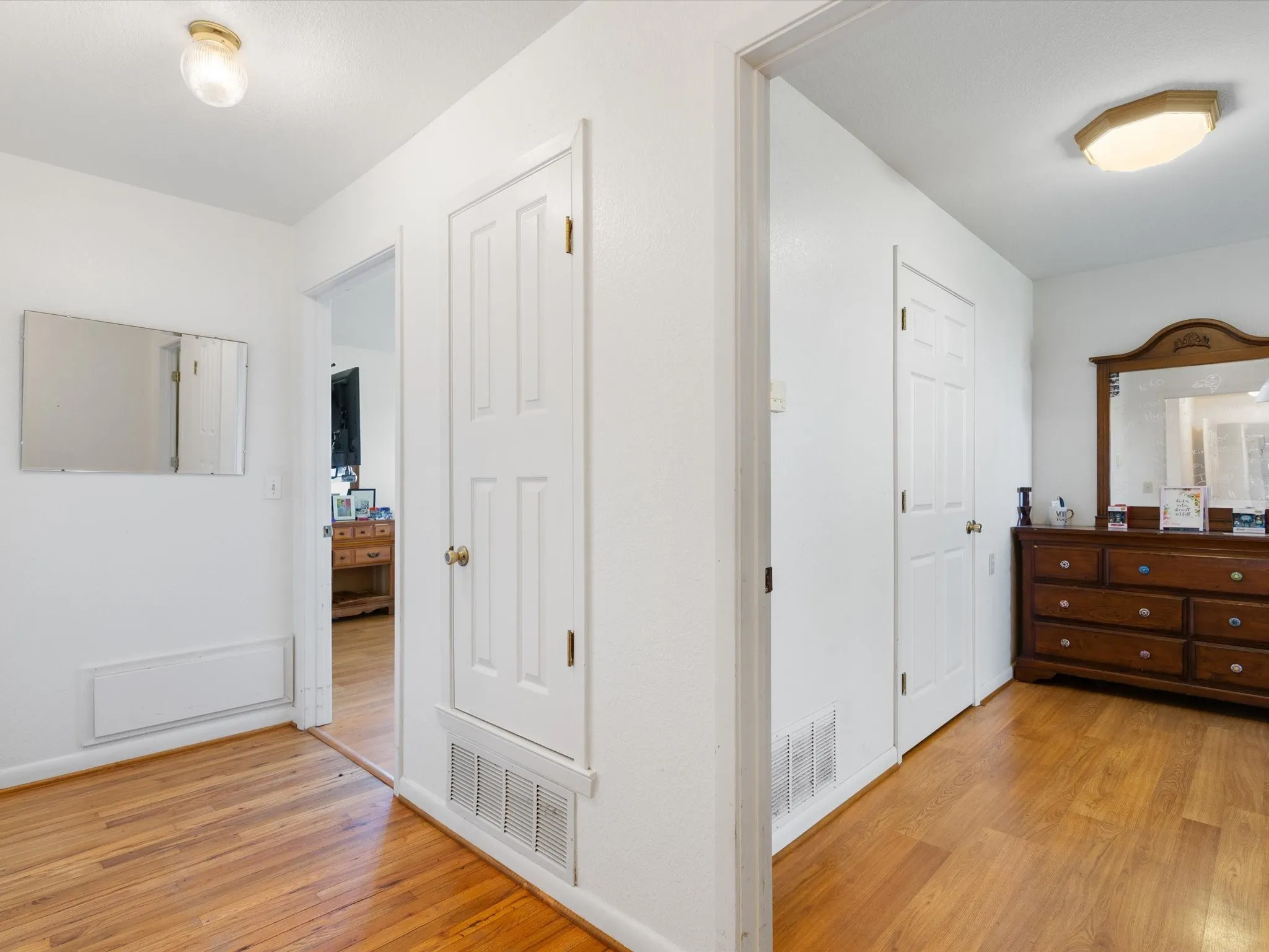 Corridor featuring light hardwood / wood-style flooring
