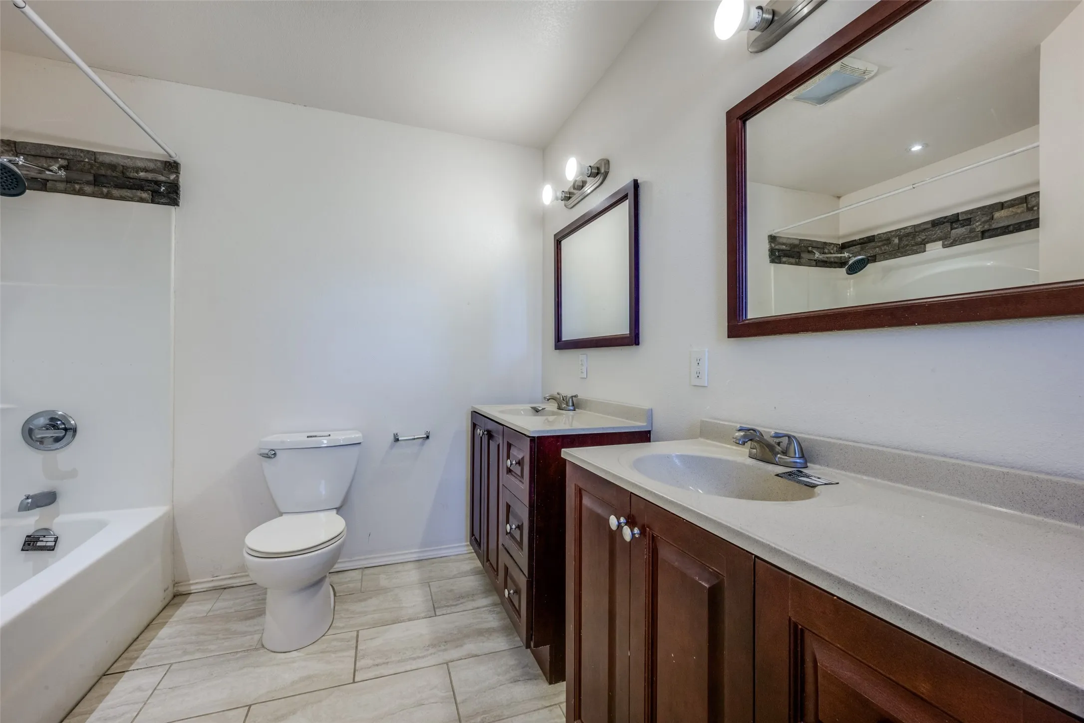 There's plenty of elbow room in the primary bath. Morning rush will be so much easier.