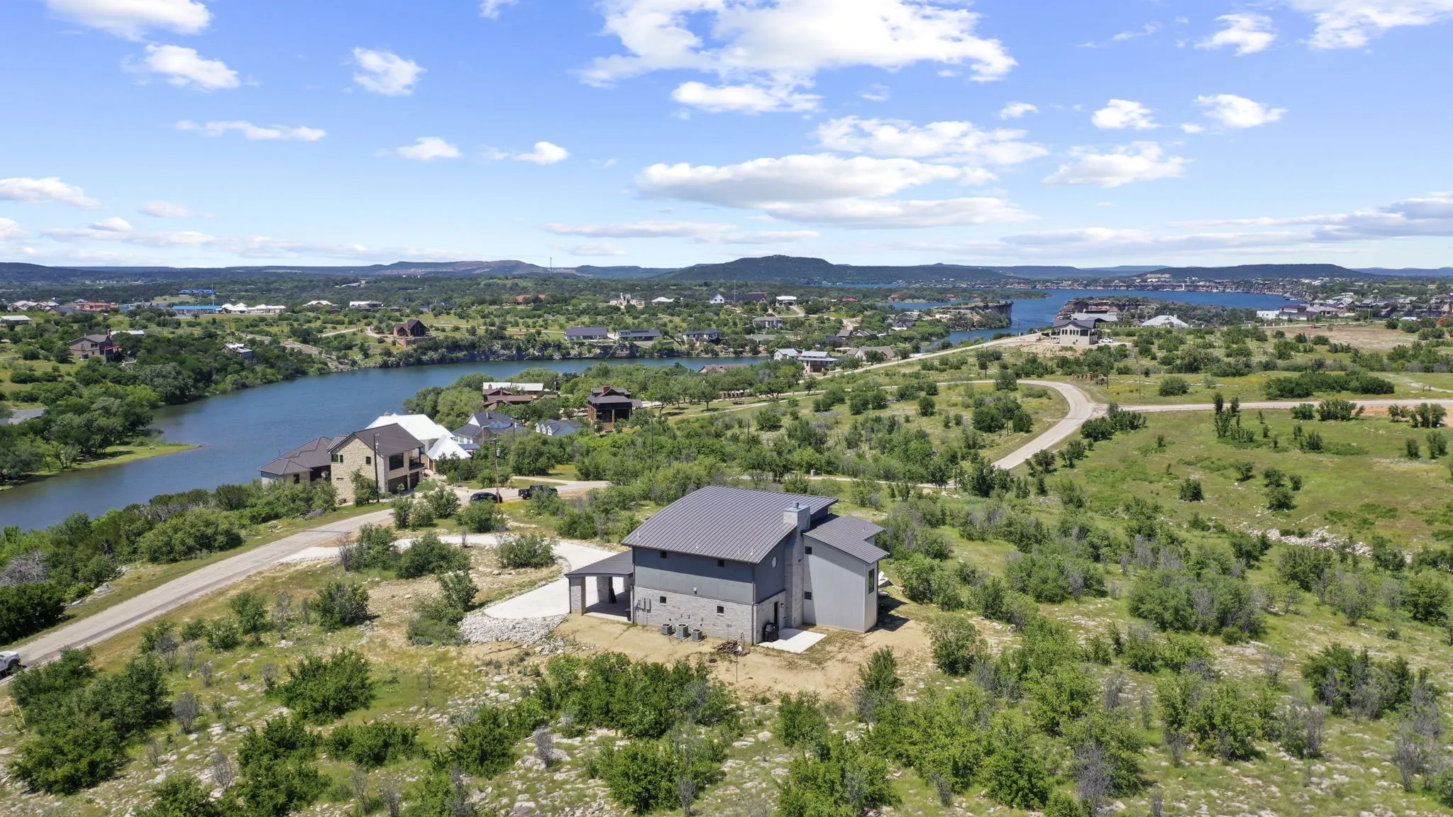 Single Family Residence For Sale in Palo Pinto County , 6160 W Hells Gate Drive, Possum Kingdom Lake, Texas 76449, 5 Bedrooms, 6 Bathrooms, Garage spaces, 3,288 Sqft, built in 2022, Price $1,500,000, mls#20598991, Real Estate Agent in Possum Kingdom Lake, Homes For Sale in Palo Pinto county, Homes For Sale in Possum Kingdom Lake, Realtor in Possum Kingdom Lake Texas, Real Estate Brokerage Independent Realty Texas, Luminita Cordes Realtor