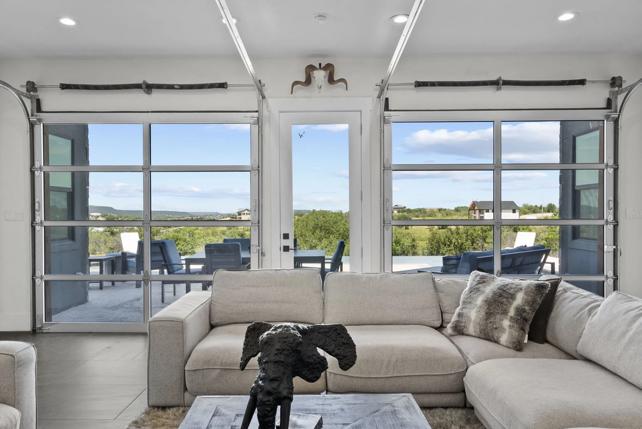 Raise the doors and the indoor and outdoor areas combine for an amazing entertainment area.