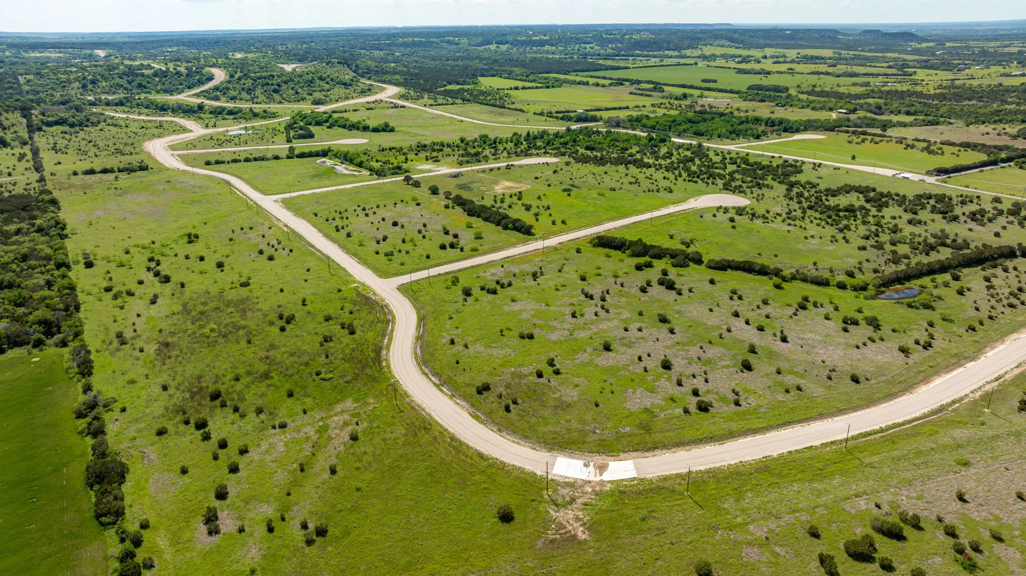 Birds eye view of property featuring a rural view