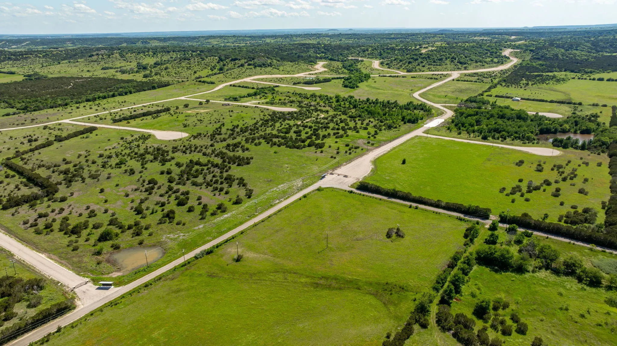 Birds eye view of property with a rural view