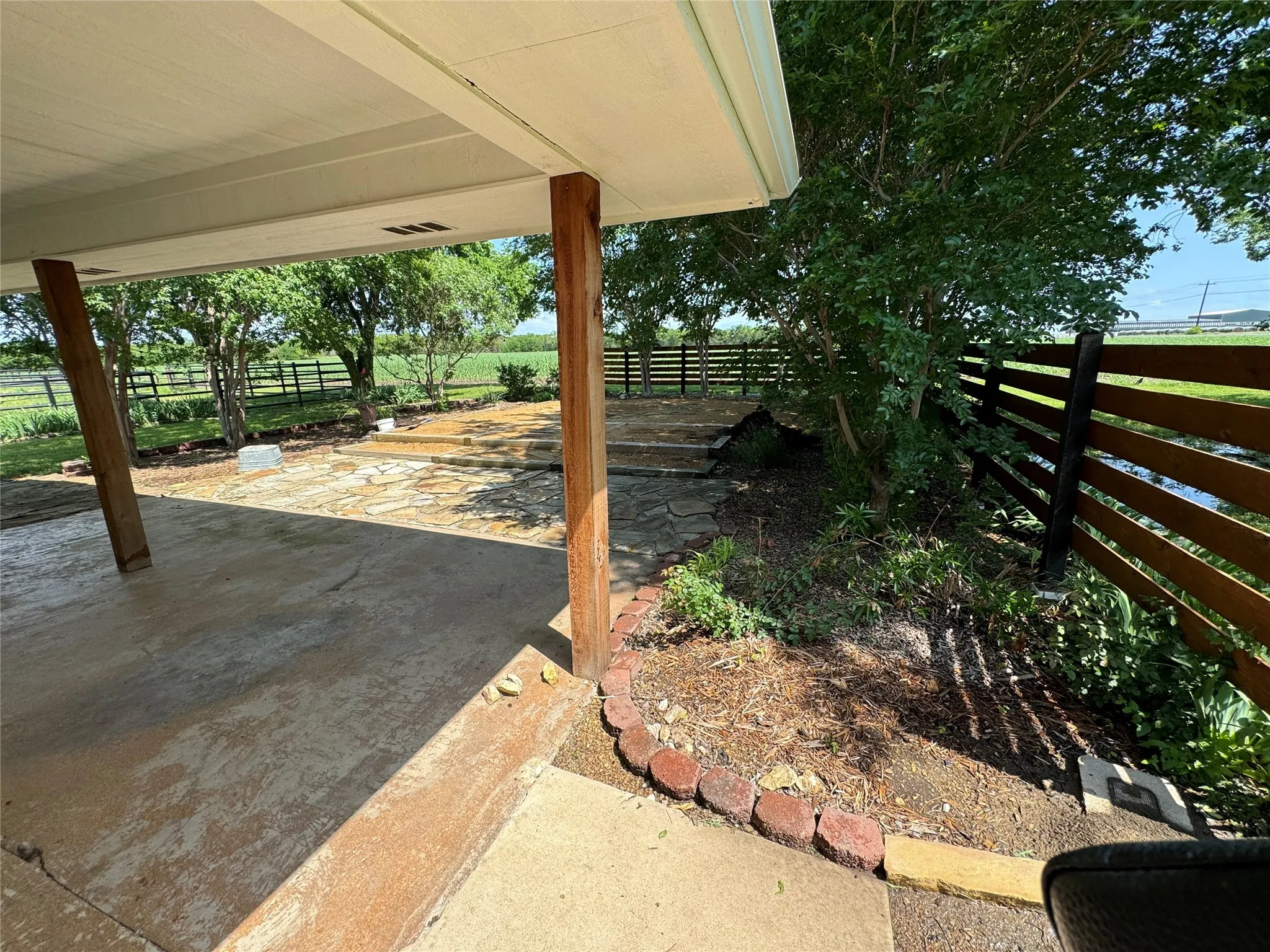 View of yard featuring a patio area and a rural view