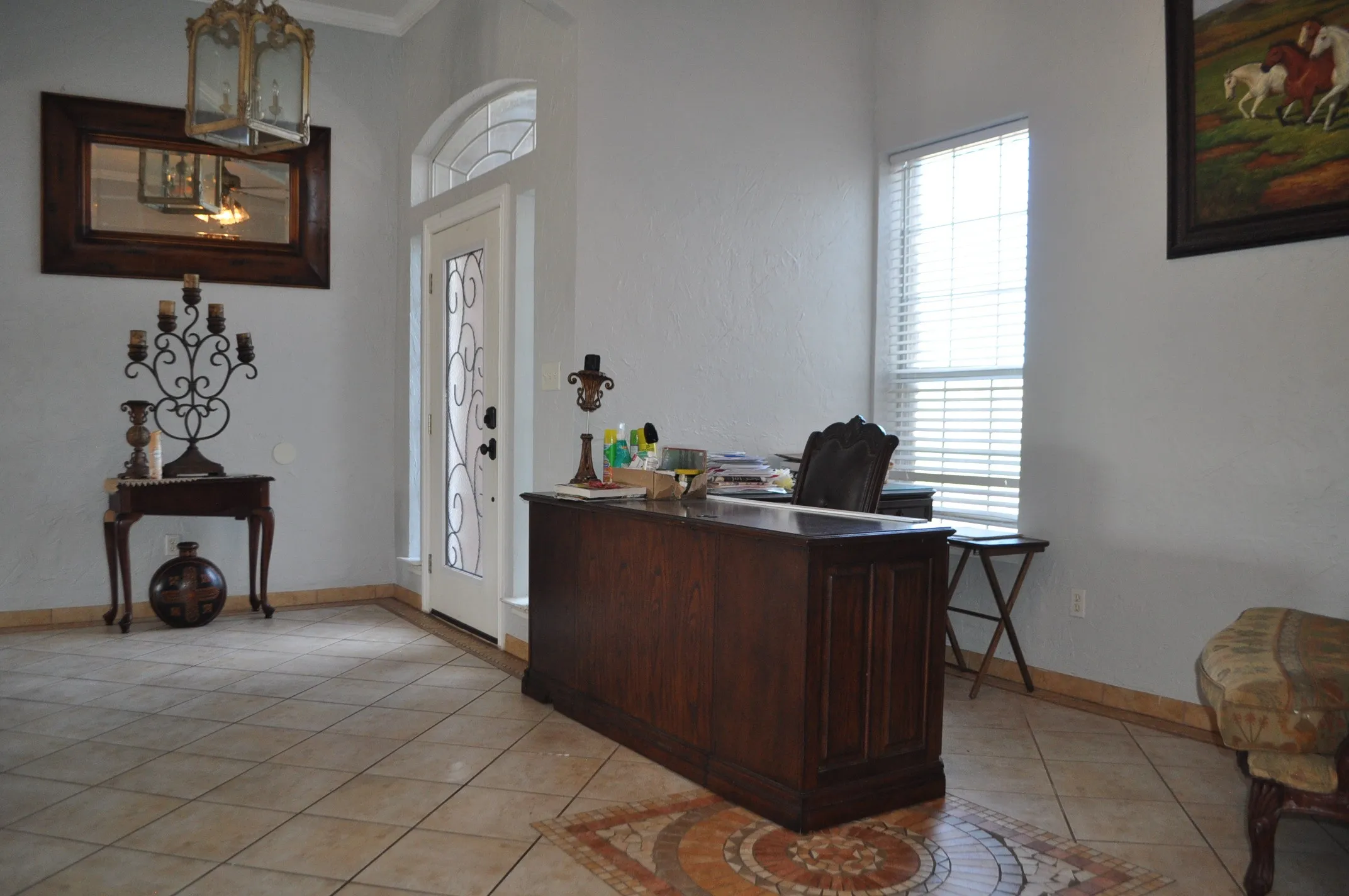 Foyer entrance with light tile flooring