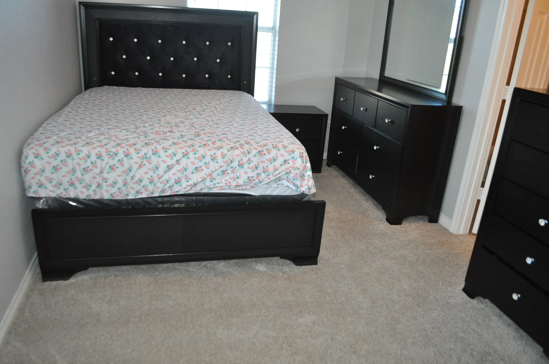 Bedroom with light carpet