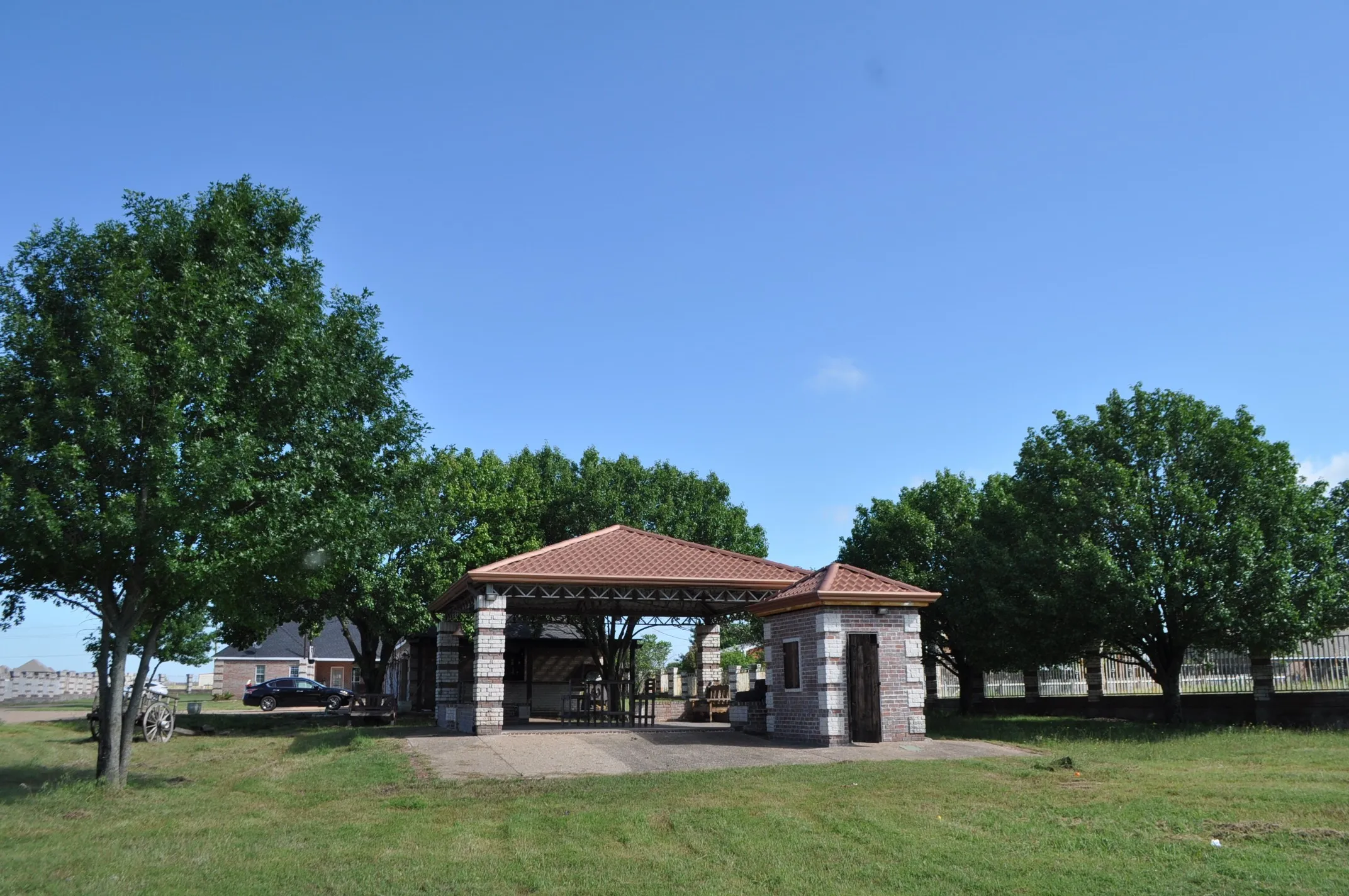 View of nearby features featuring a patio and a lawn
