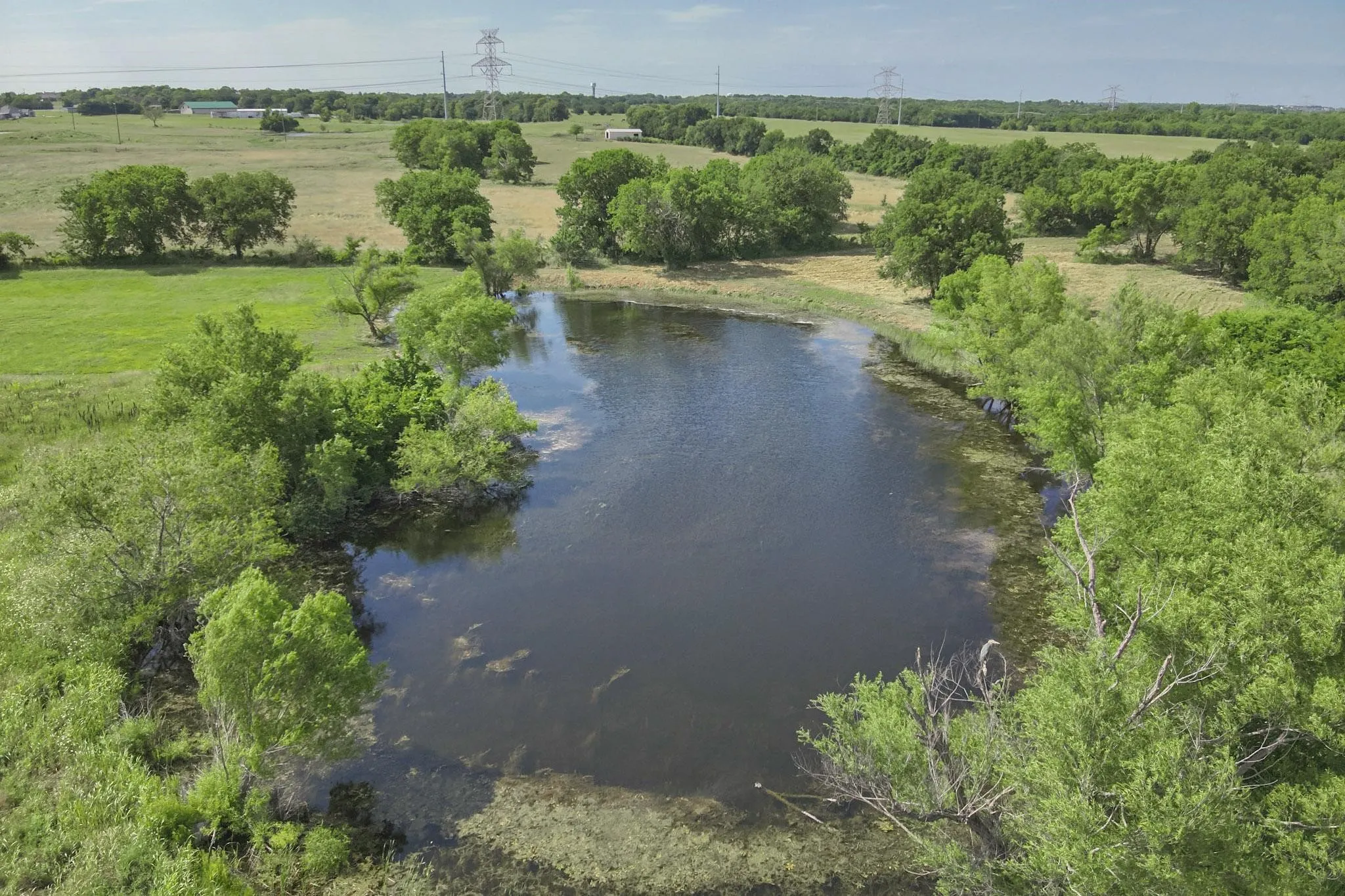 Drone / aerial view of shared pond