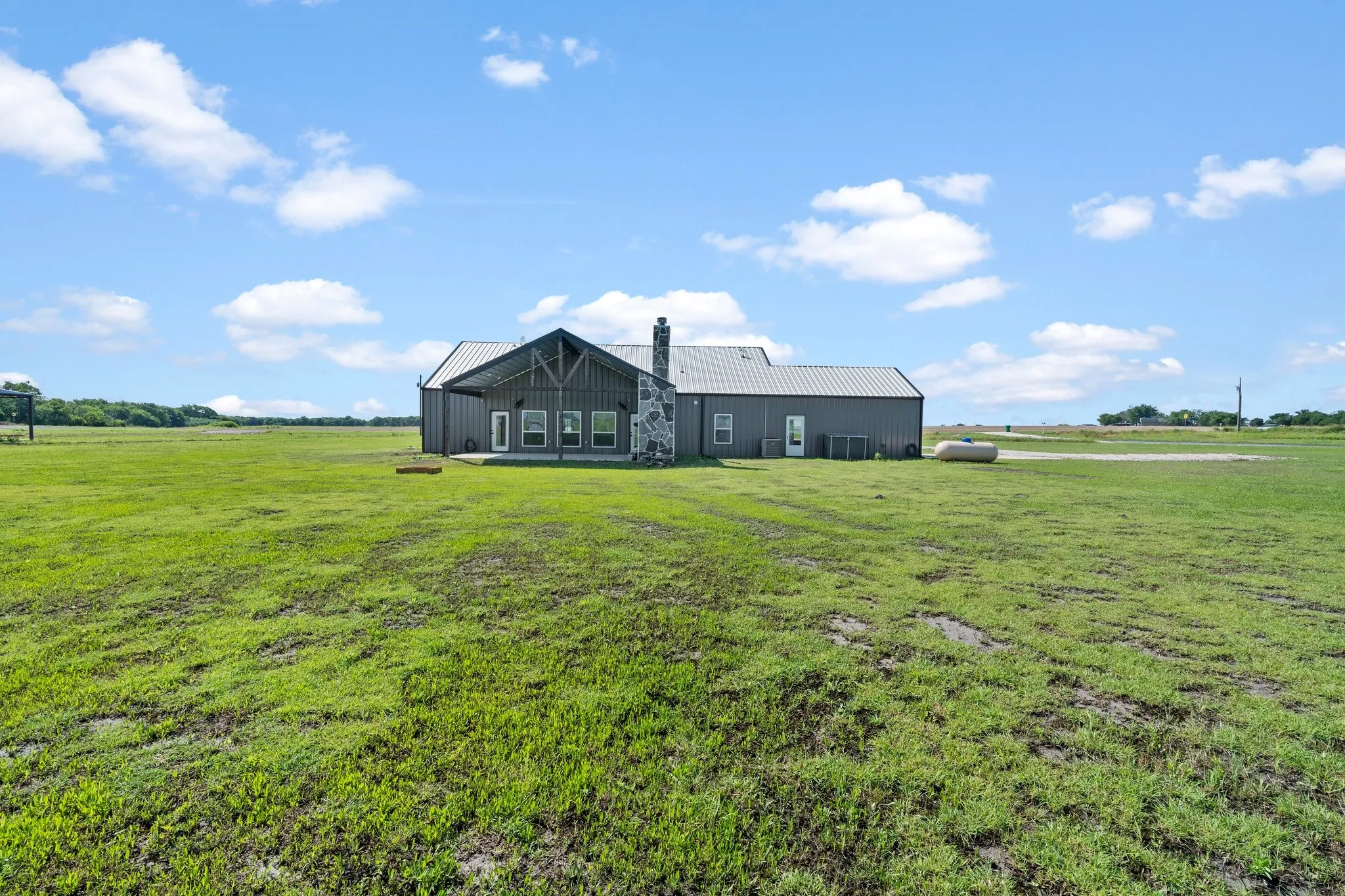 View of yard with a rural view