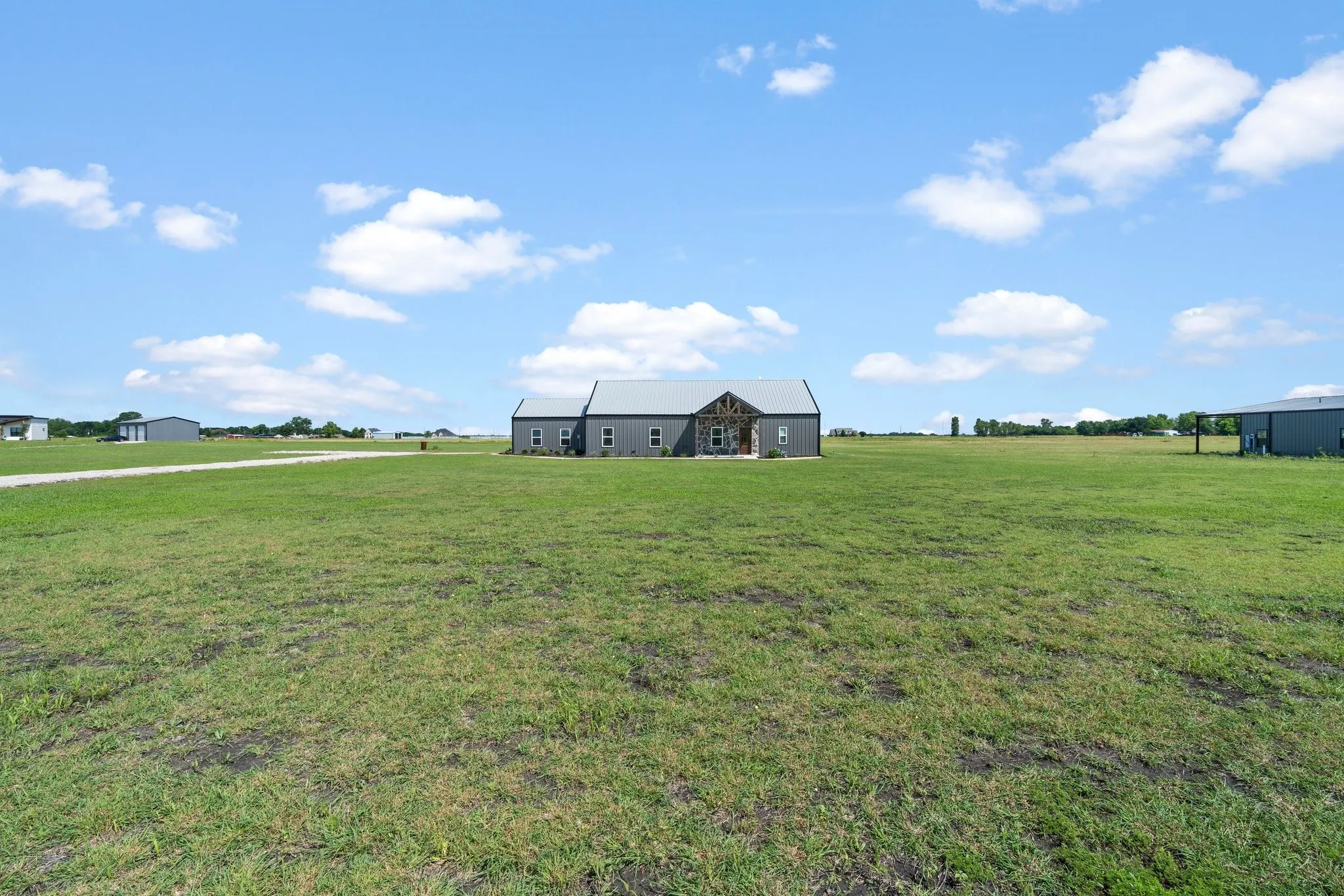 View of yard with a rural view