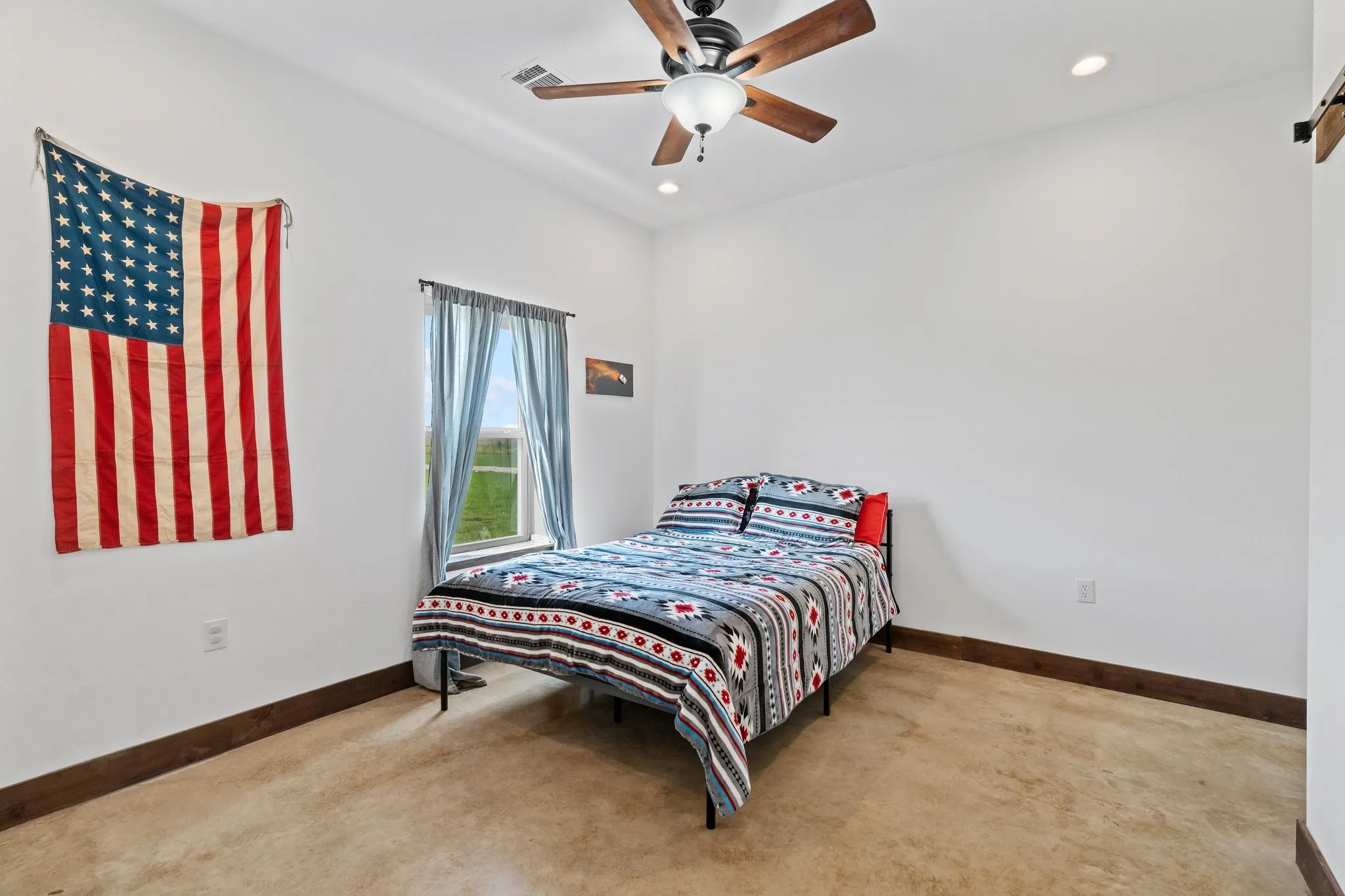 Bedroom featuring carpet and ceiling fan