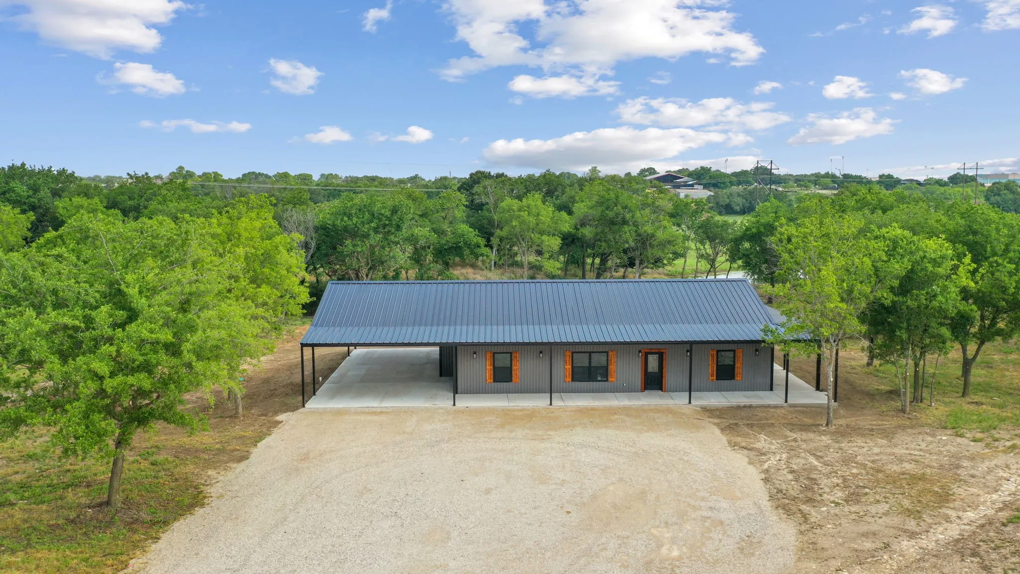 View of front of home featuring a carport