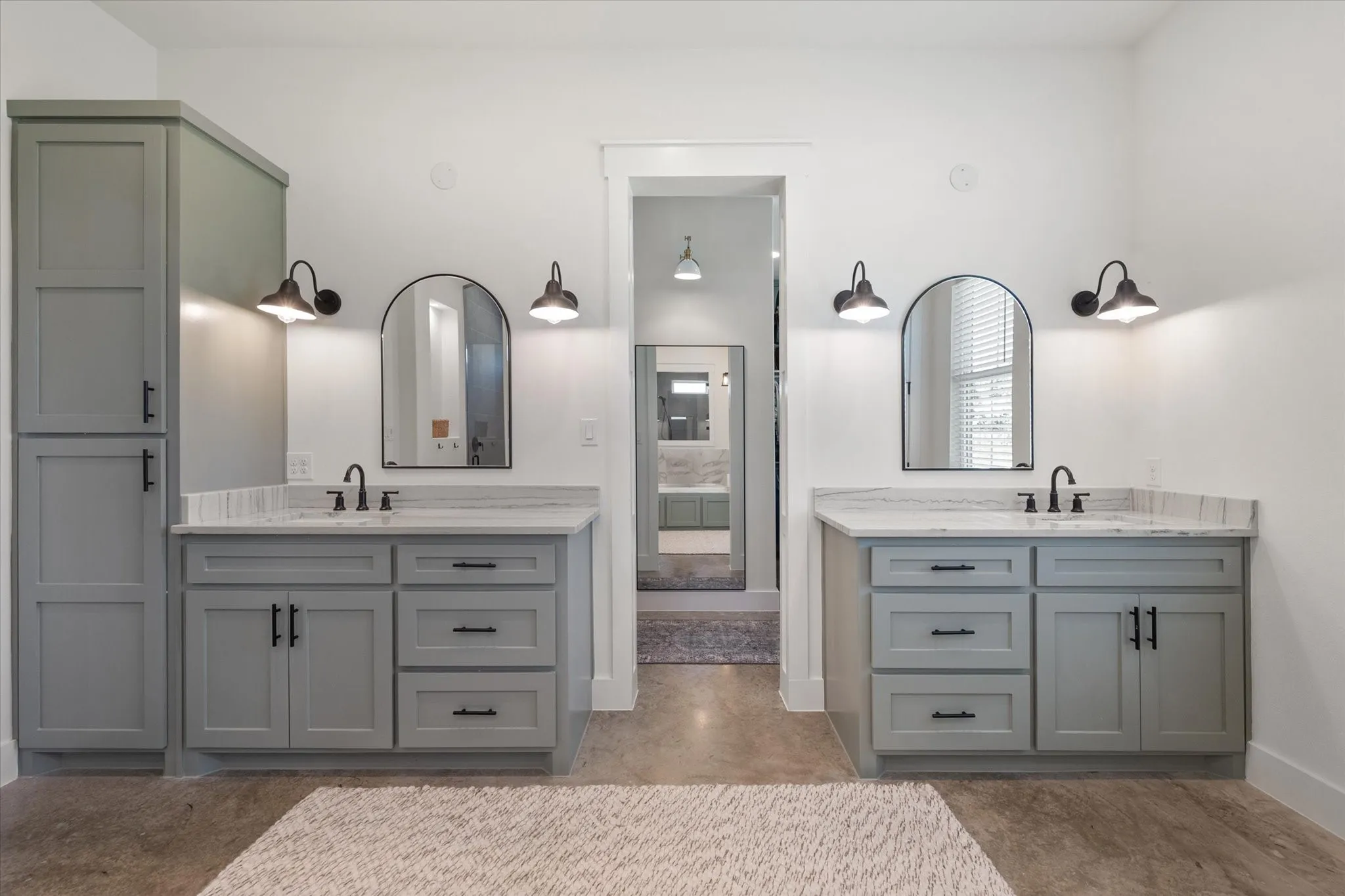 Primary Bathroom suite featuring tile floors and dual vanity