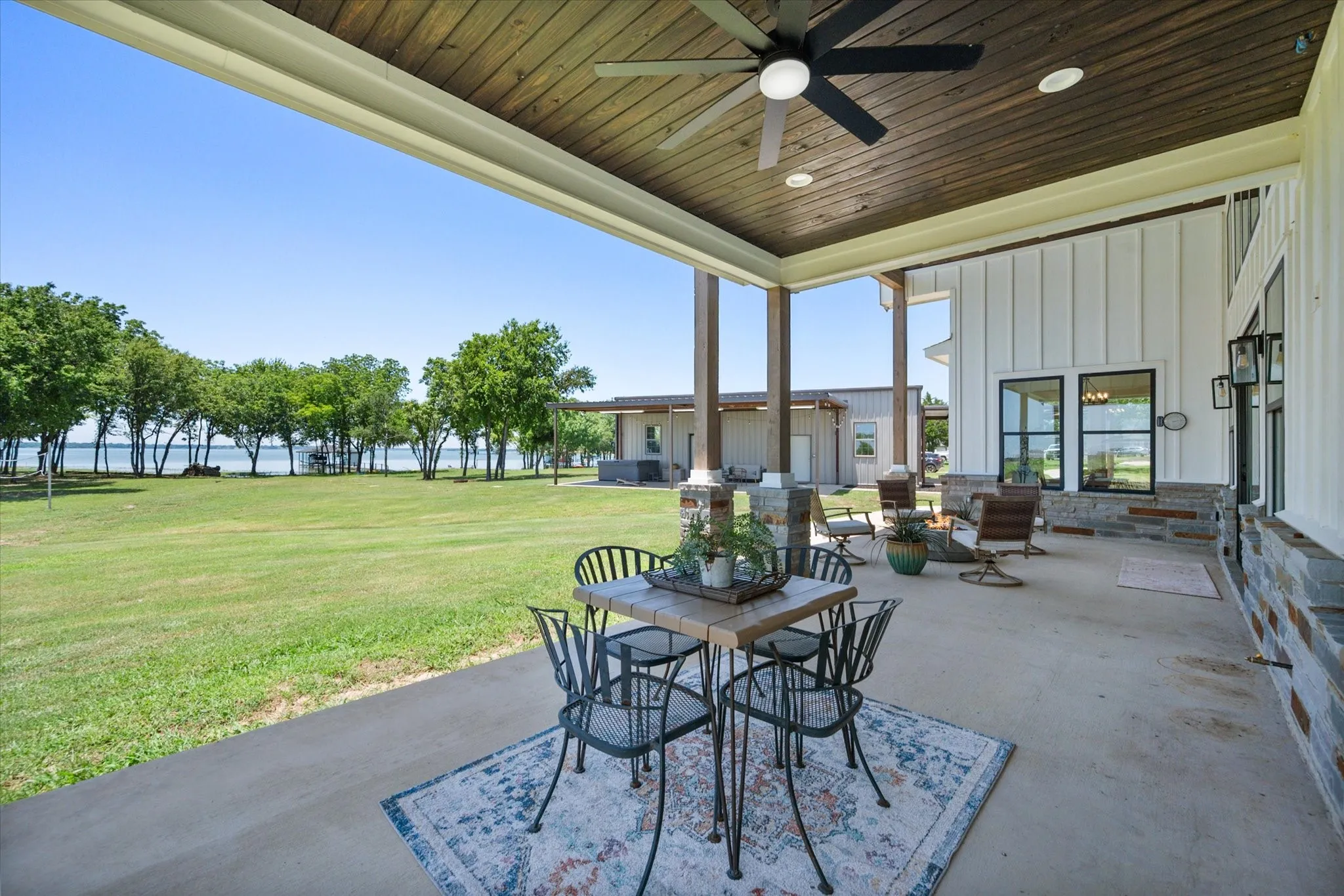 View of patio with multiple seating areas