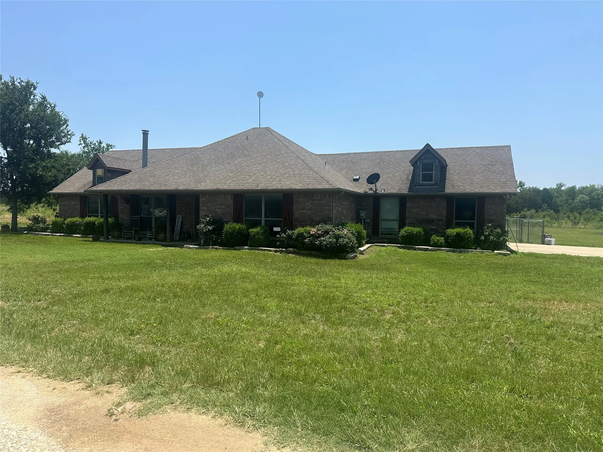 View of front of house with a front lawn