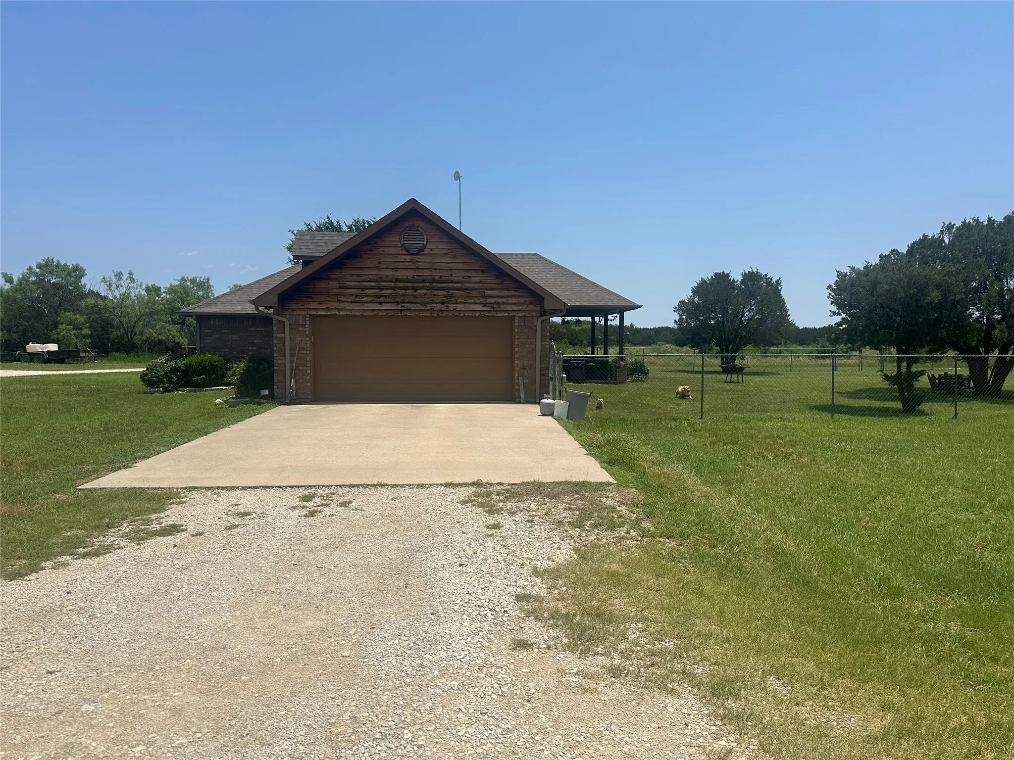 View of front of property with a front lawn