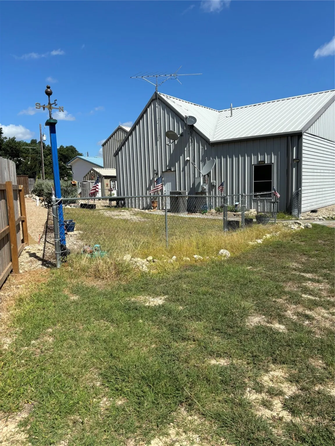 back of house door to office and fenced part of yard