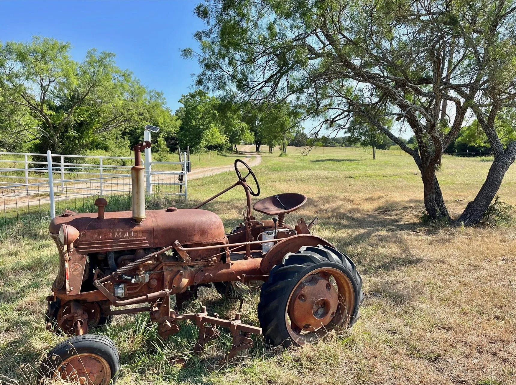 View of yard with a rural view