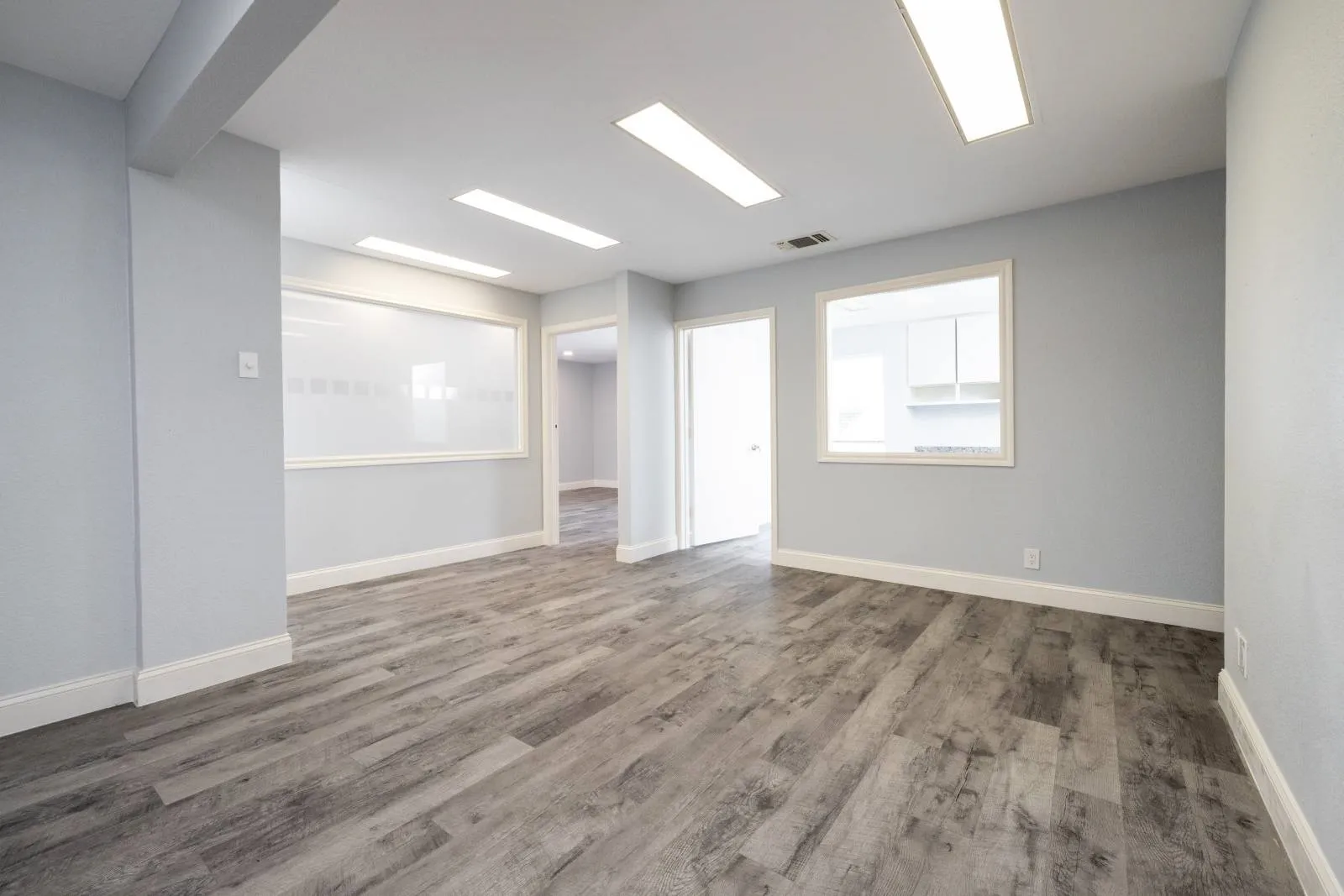 Unfurnished room featuring hardwood / wood-style flooring