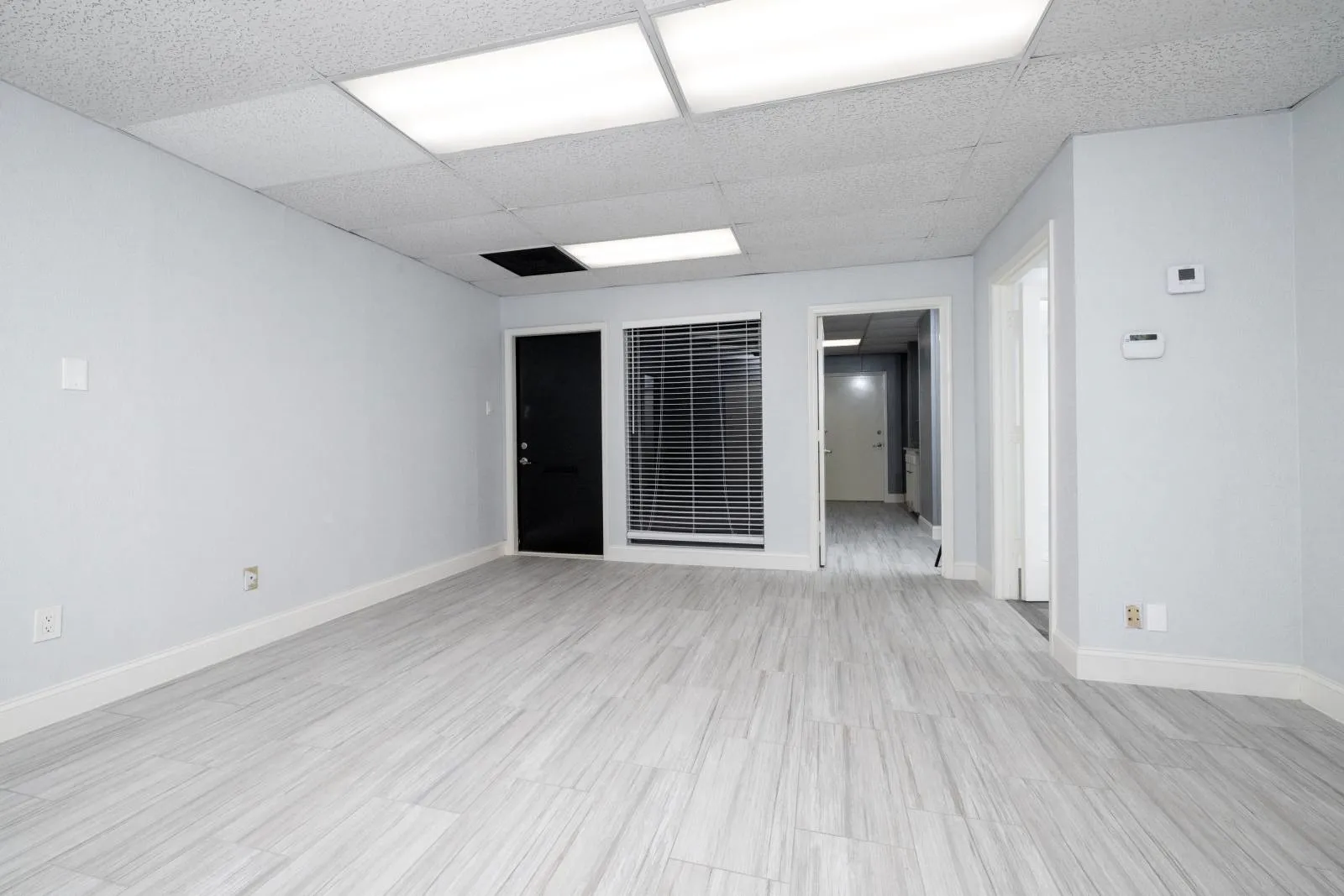 Unfurnished room featuring a paneled ceiling