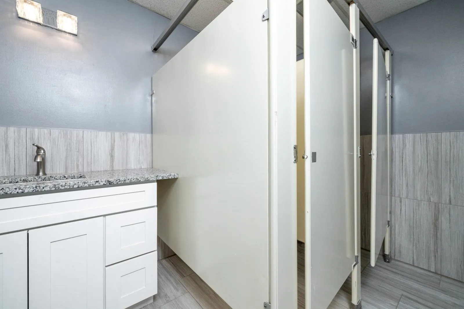 Bathroom with vanity and tile patterned flooring