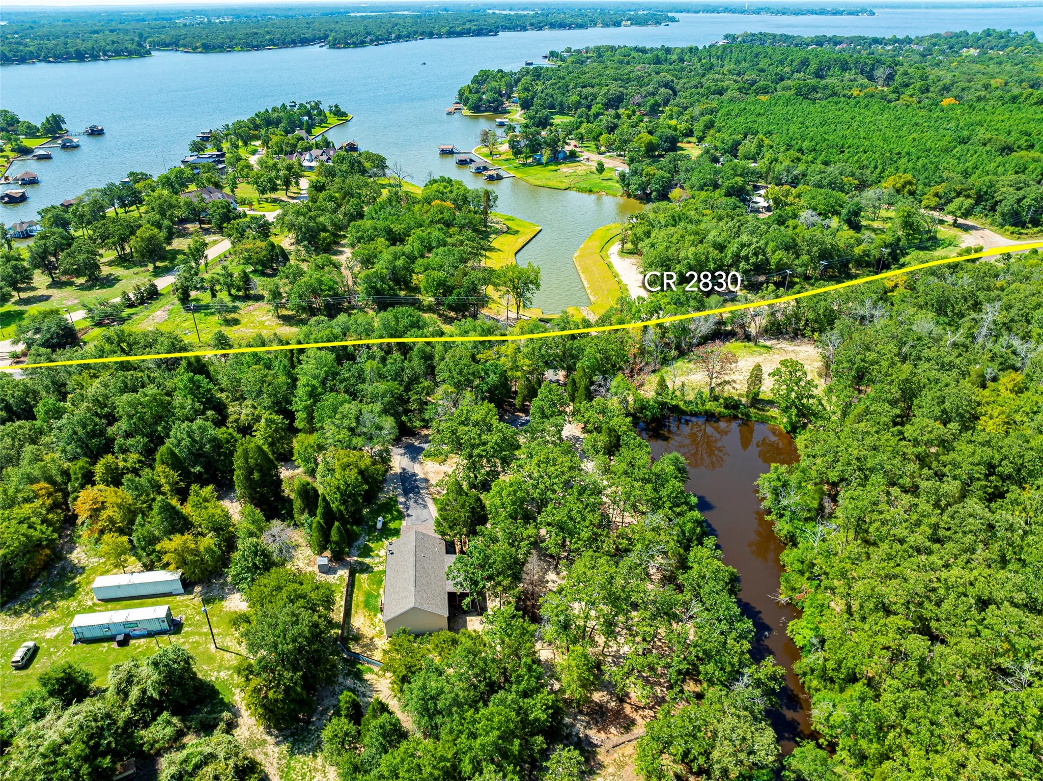 Drone / aerial view with a water view CR 2830 is the LINE