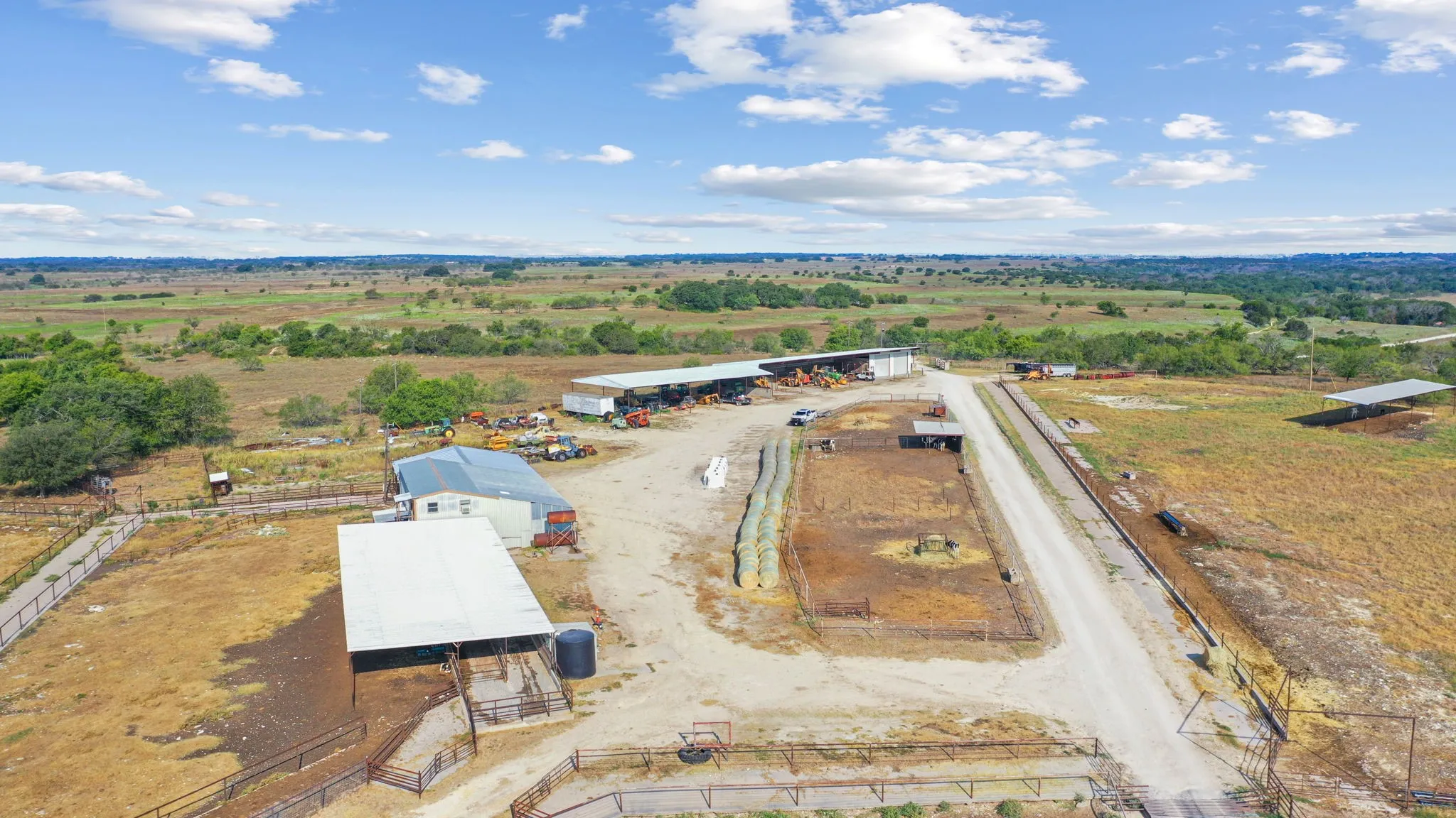 Birds eye view of property with a rural view