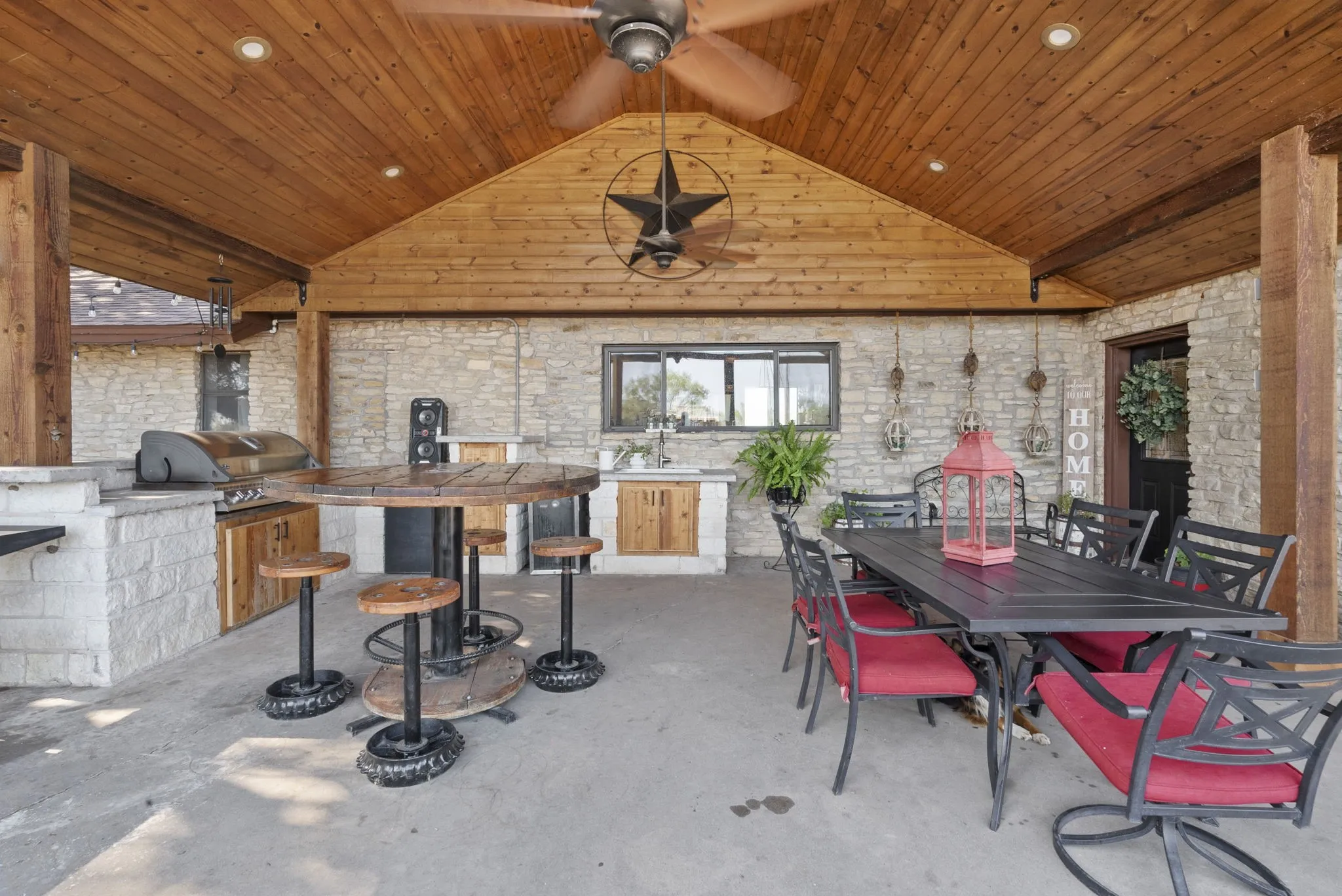 View of patio / terrace with area for grilling and ceiling fan