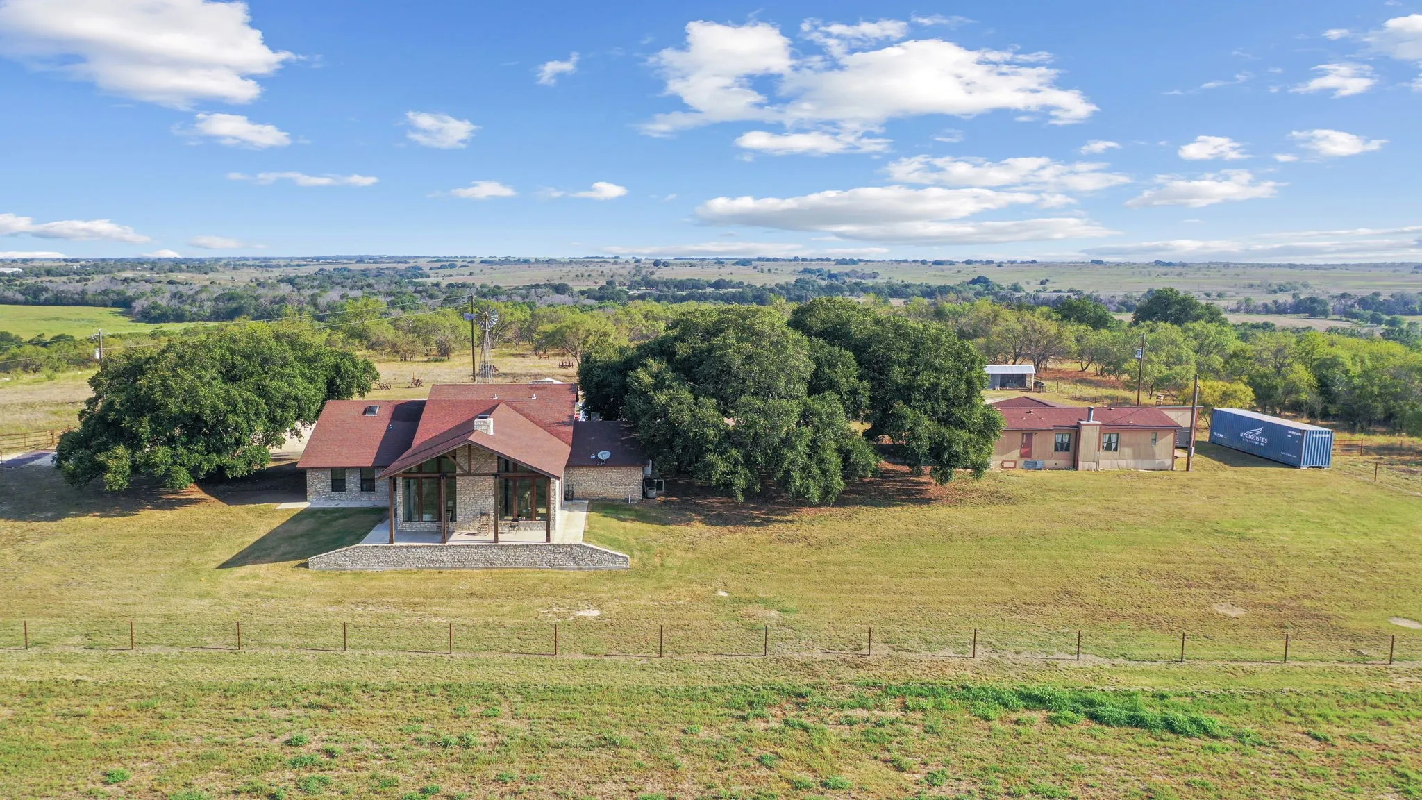 Birds eye view of property with a rural view