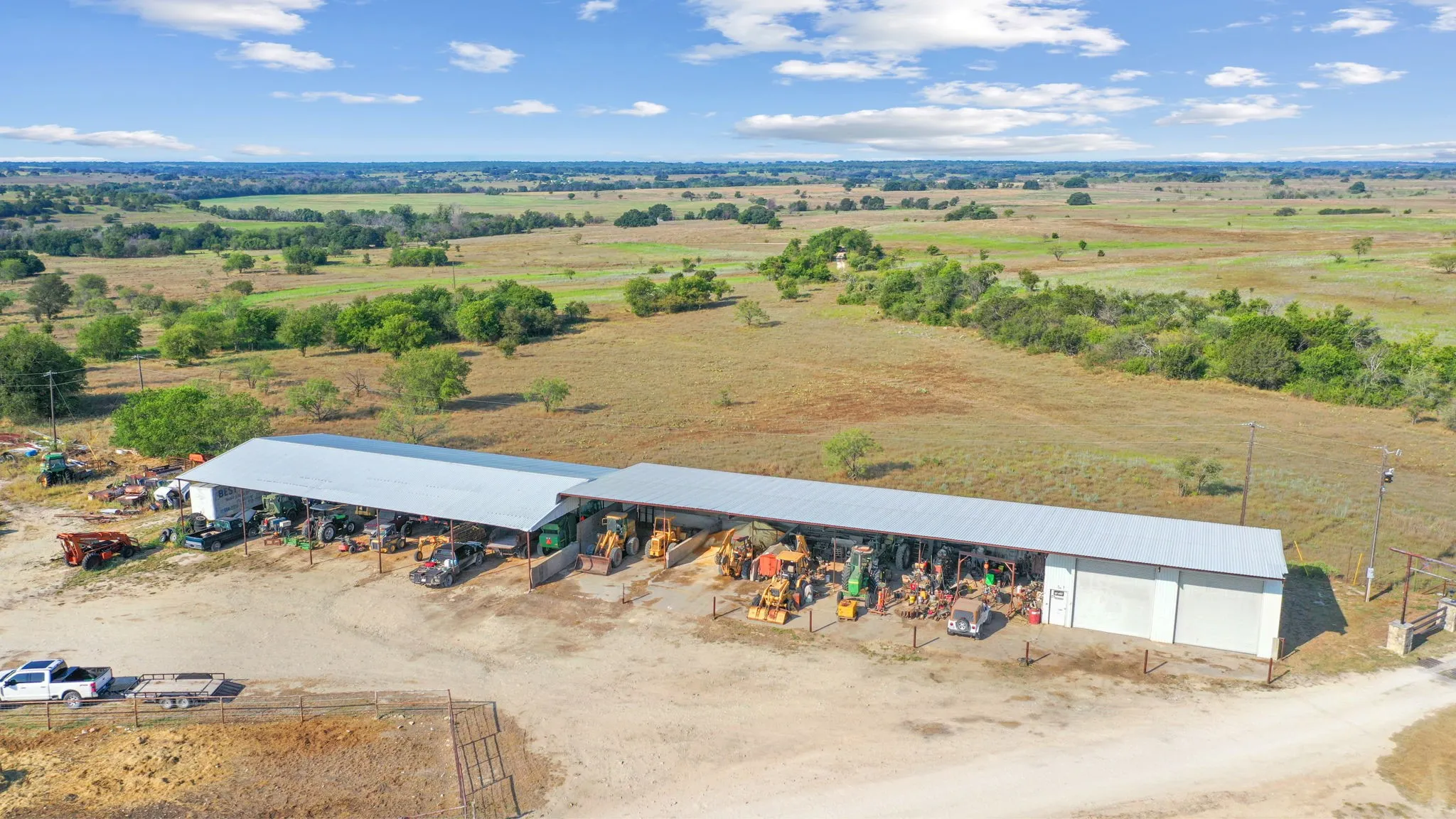 Birds eye view of property featuring a rural view