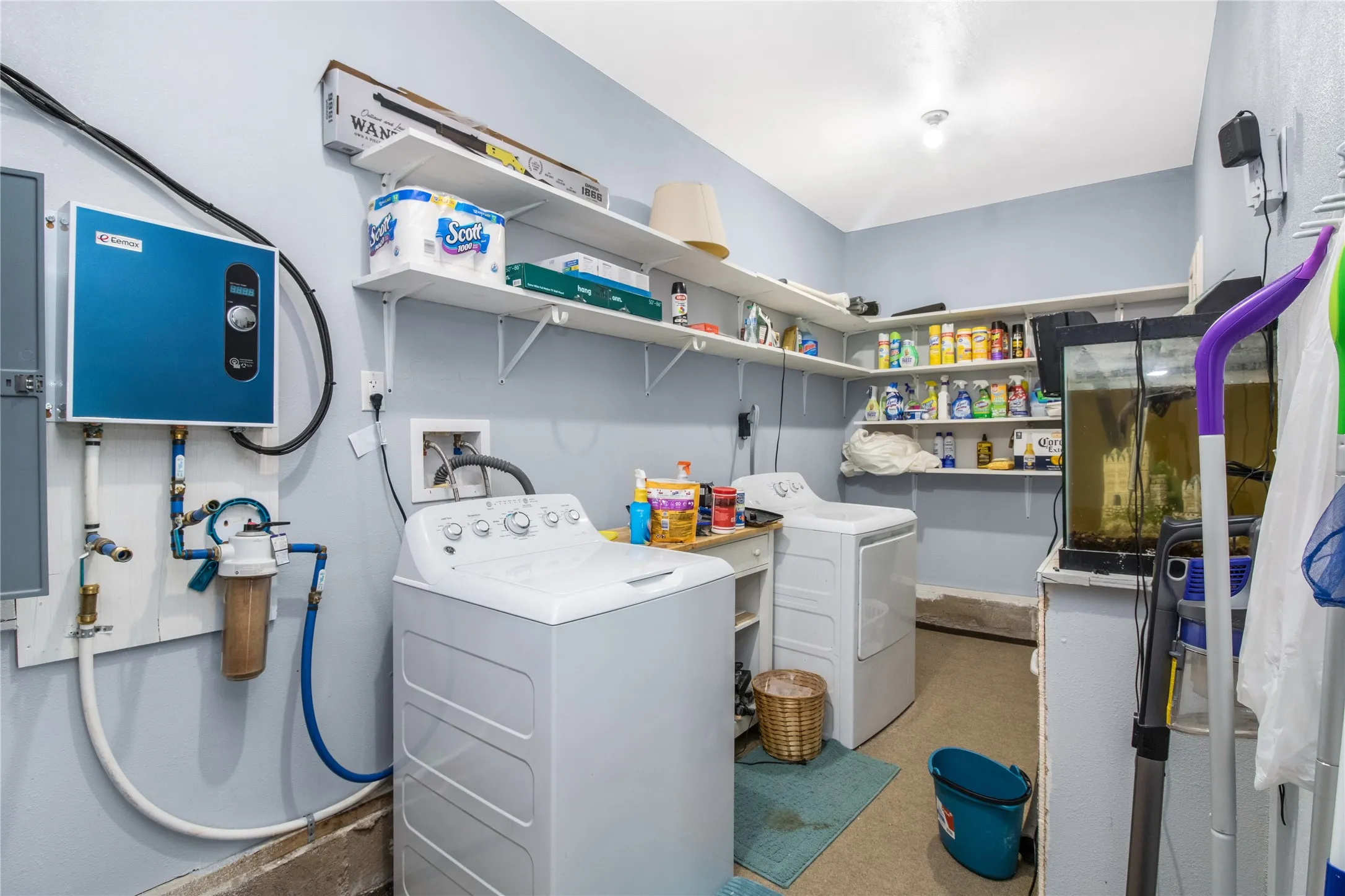 Laundry room featuring washer and clothes dryer