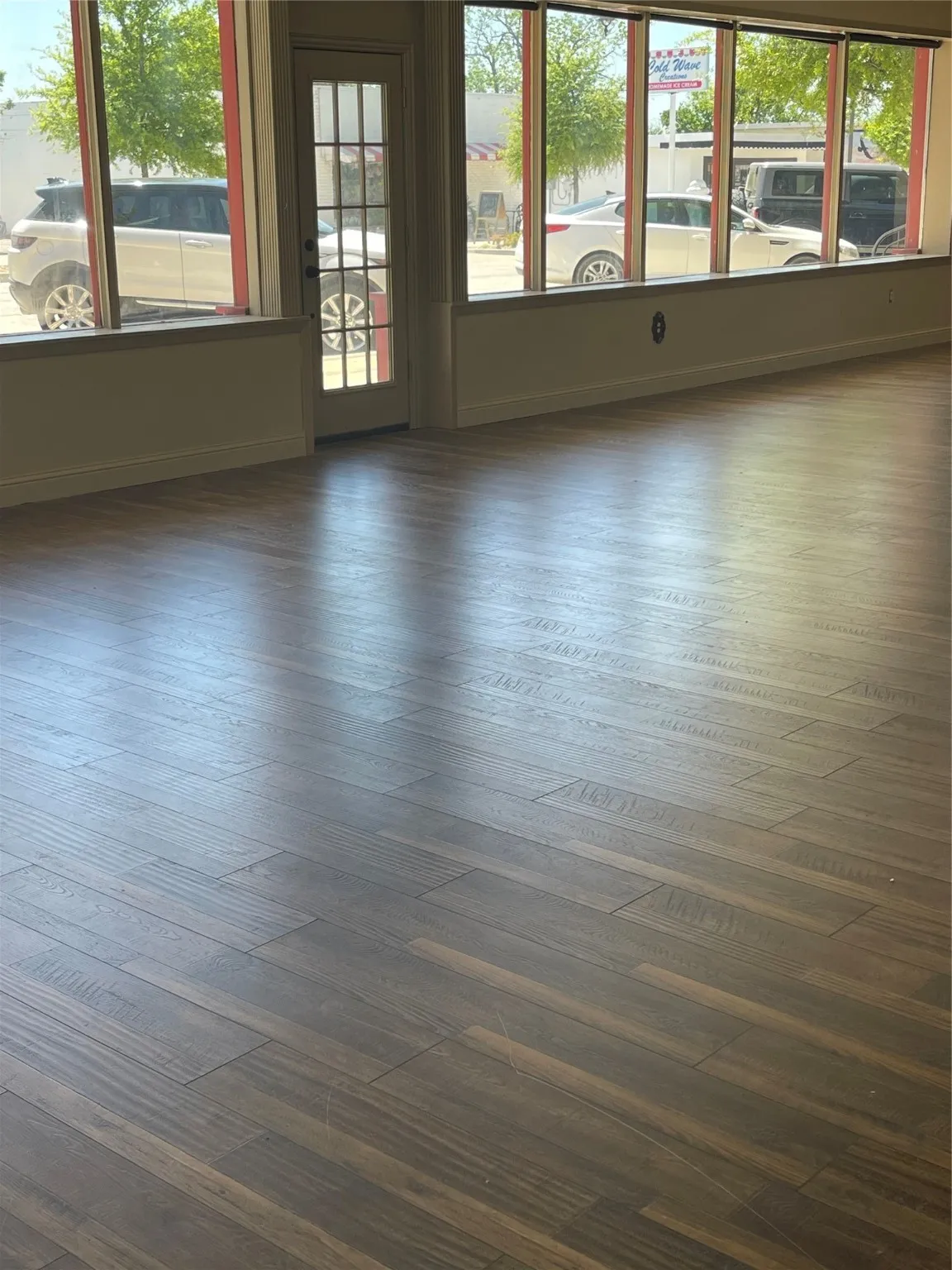 Spare room with hardwood / wood-style floors