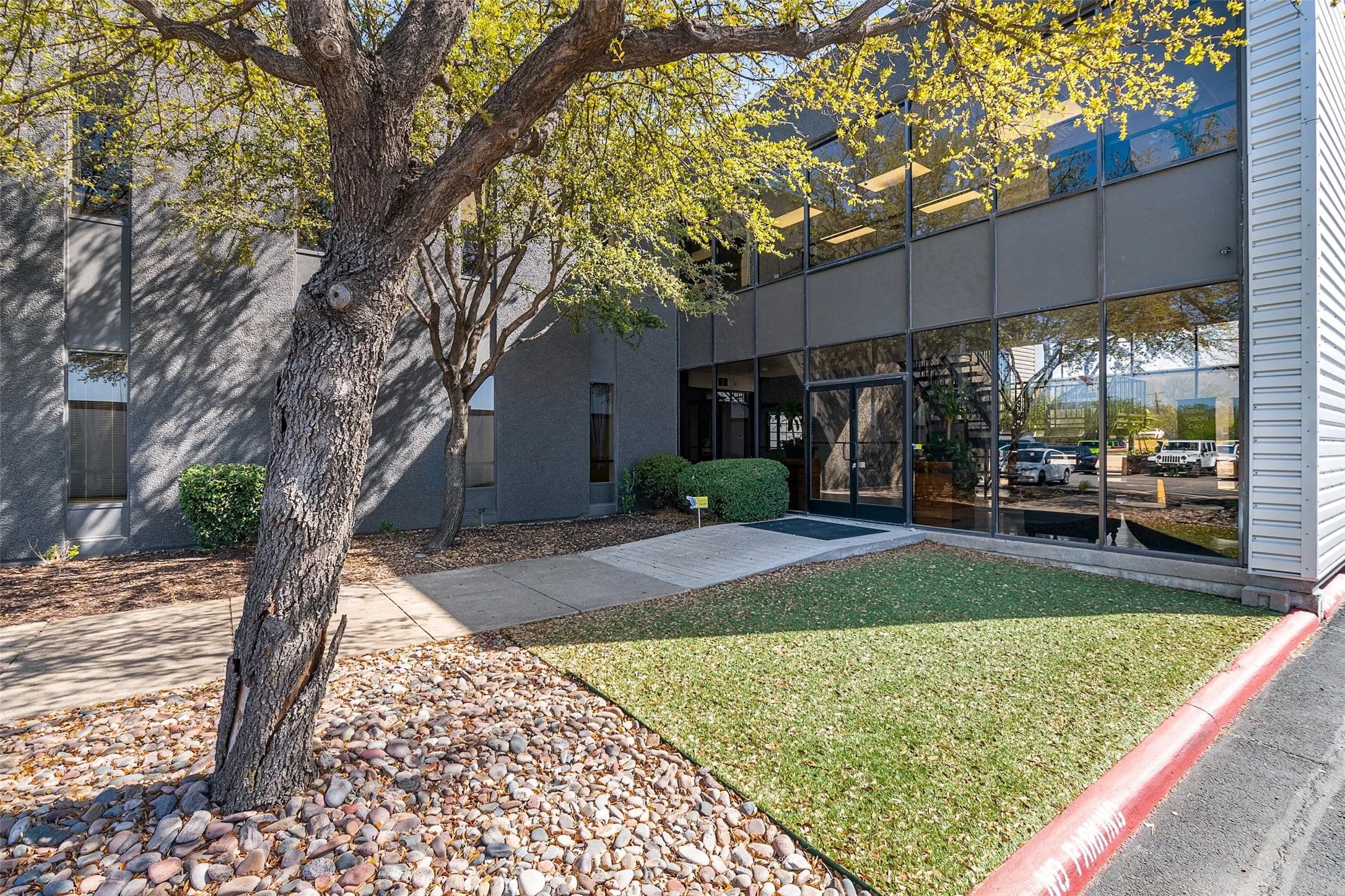 View of property's community featuring a yard