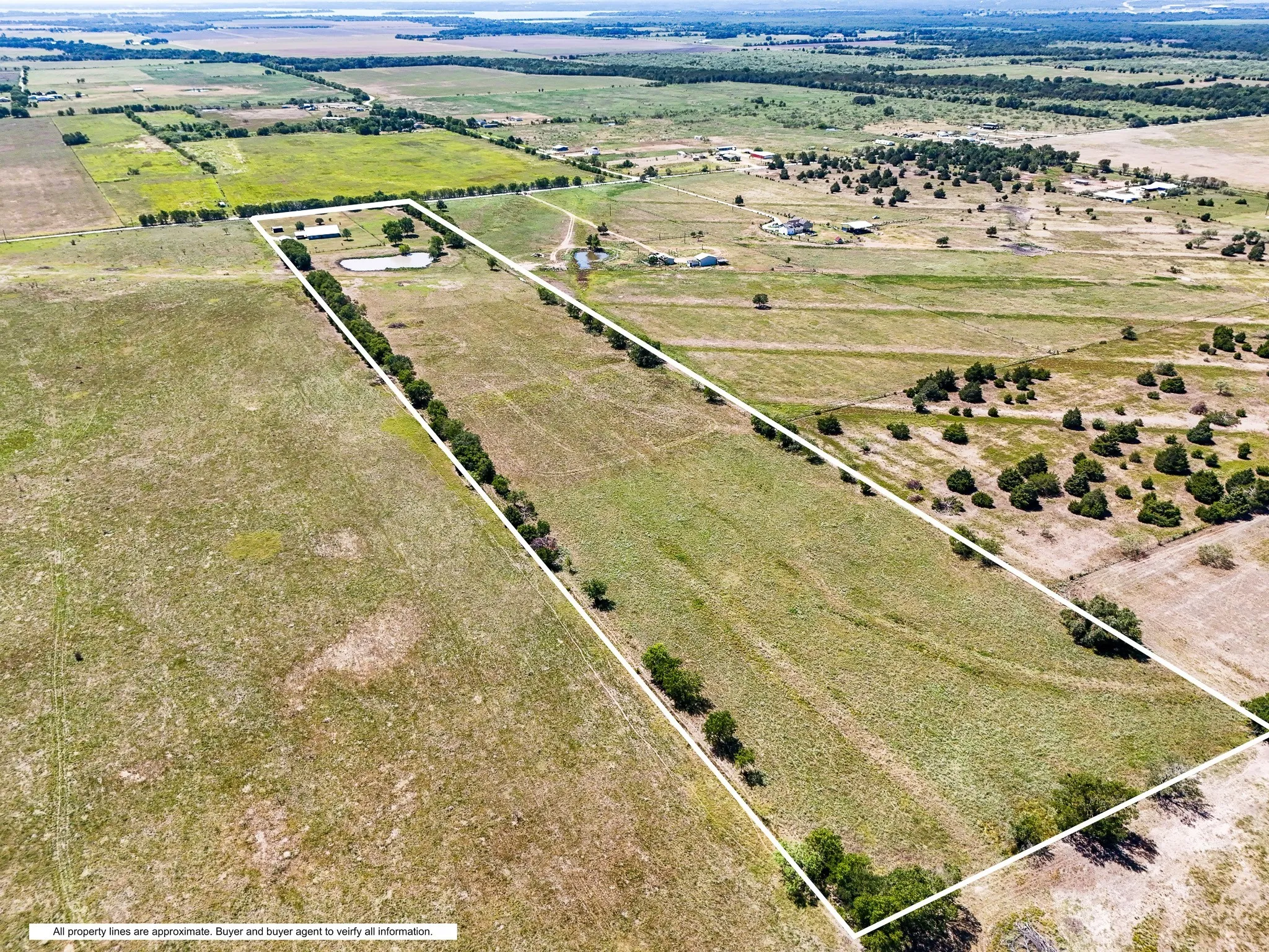 Birds eye view of property featuring a rural view