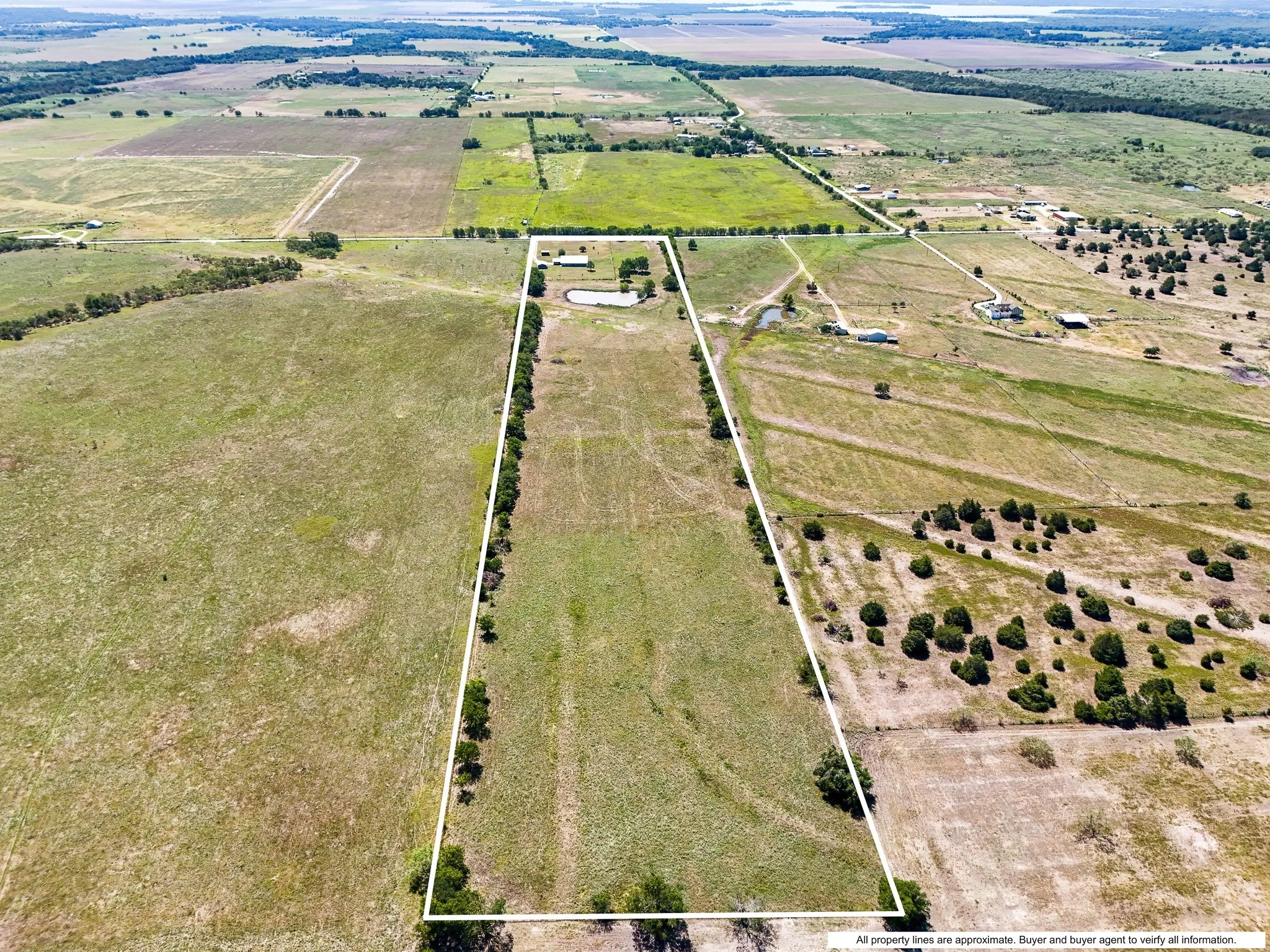 Birds eye view of property featuring a rural view