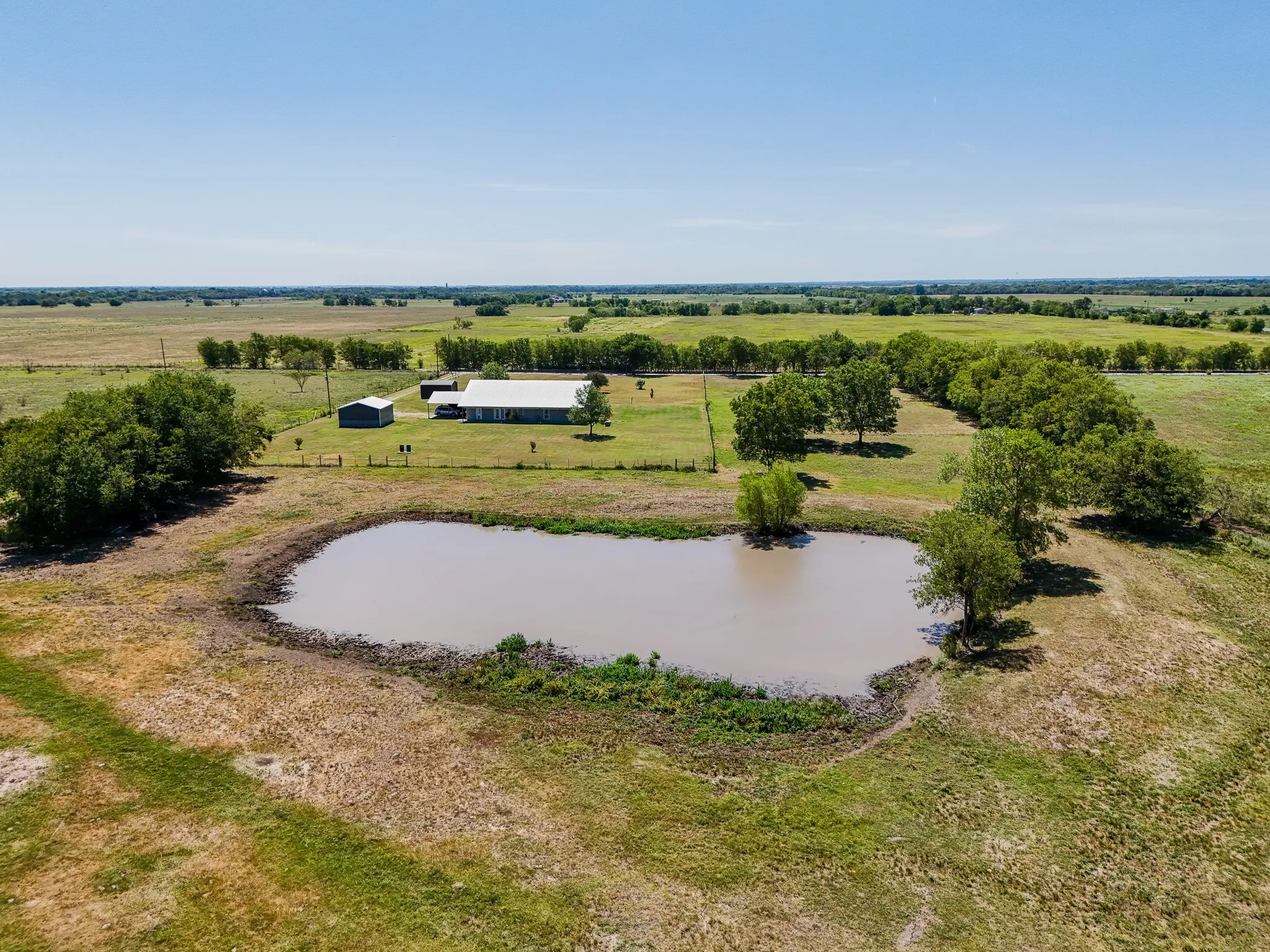Drone / aerial view featuring a rural view and a water view