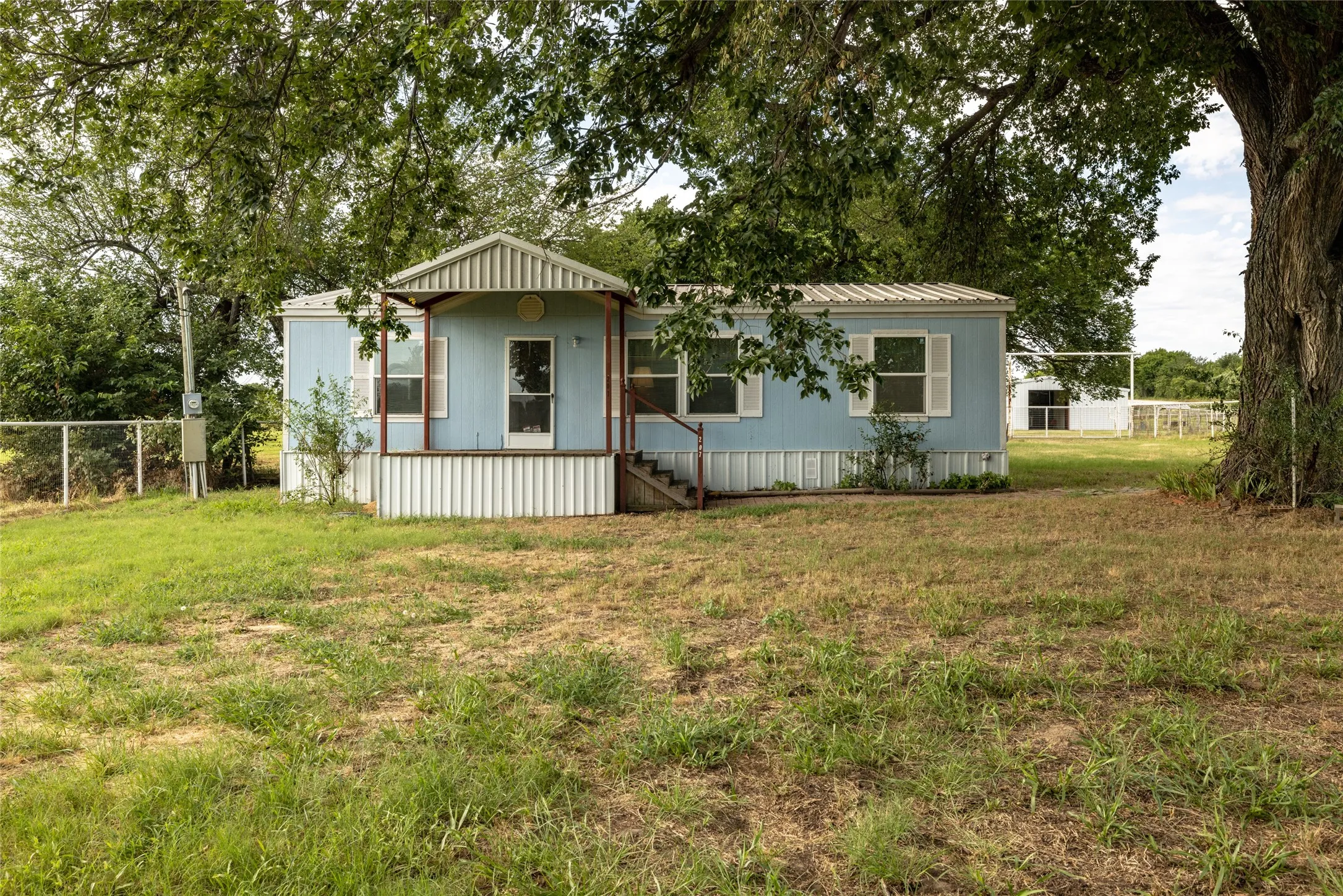 View of front of home with a front yard