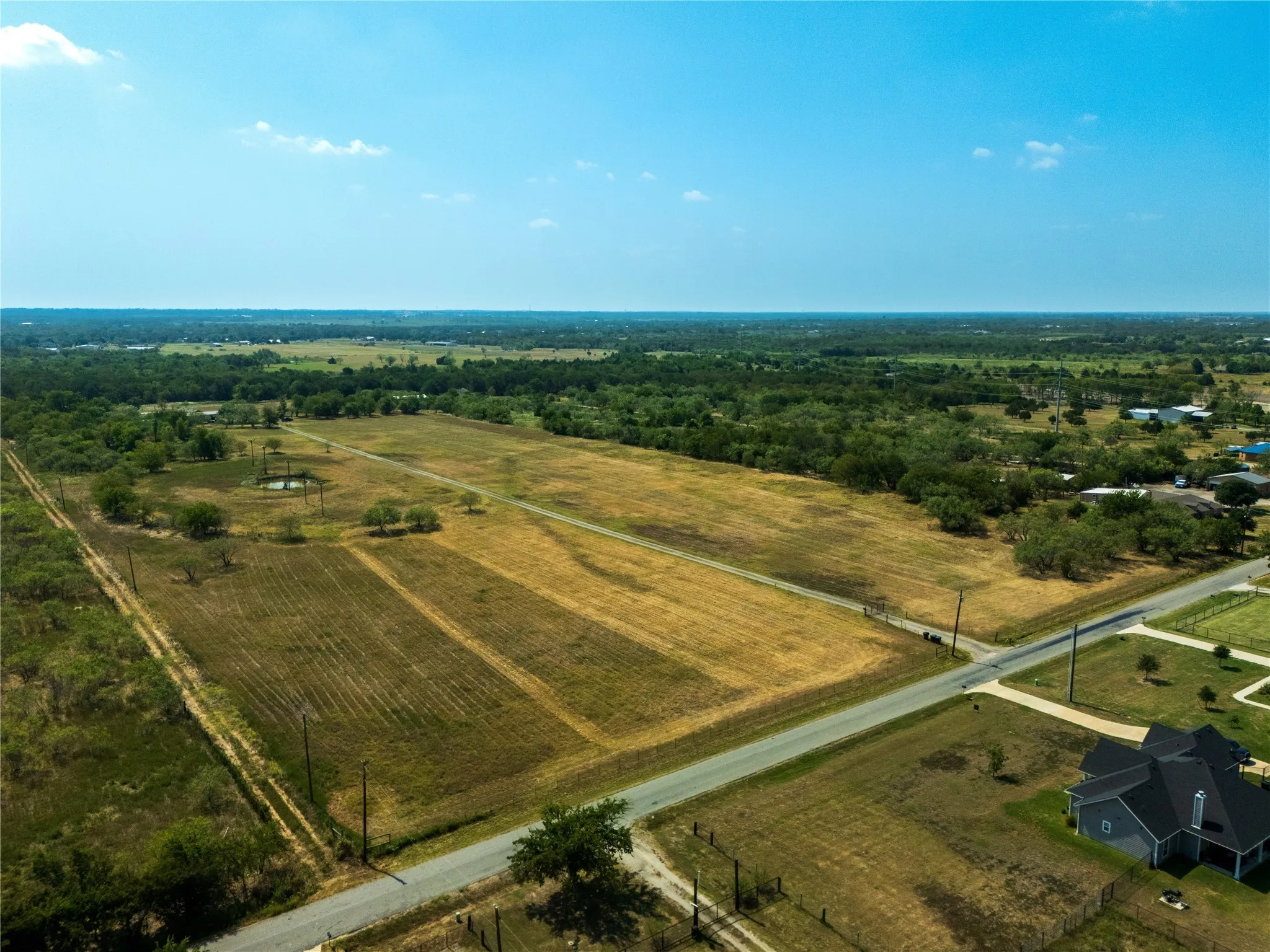 Birds eye view of property with a rural view