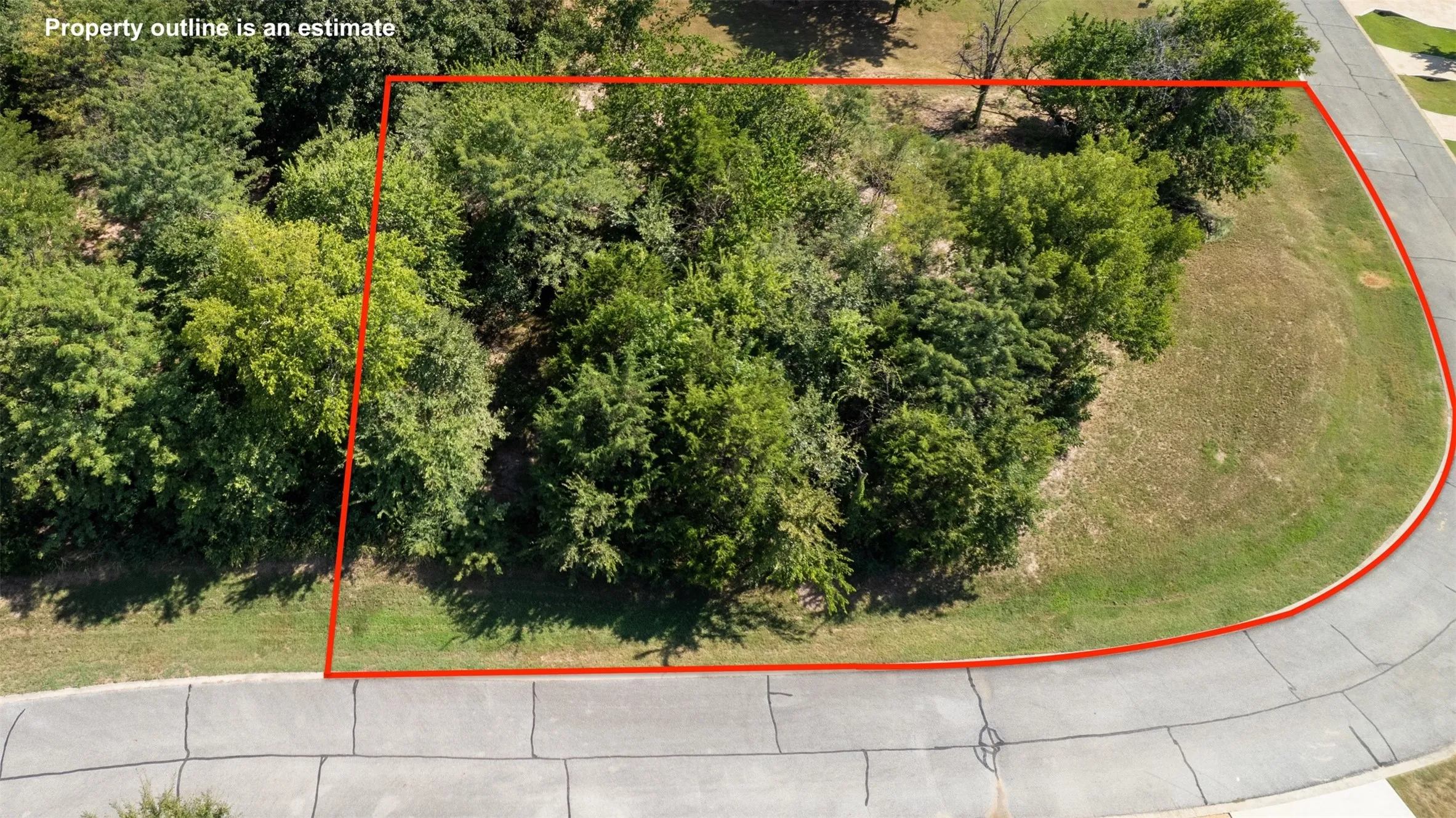 Aerial view of property's location featuring property parcel outlined