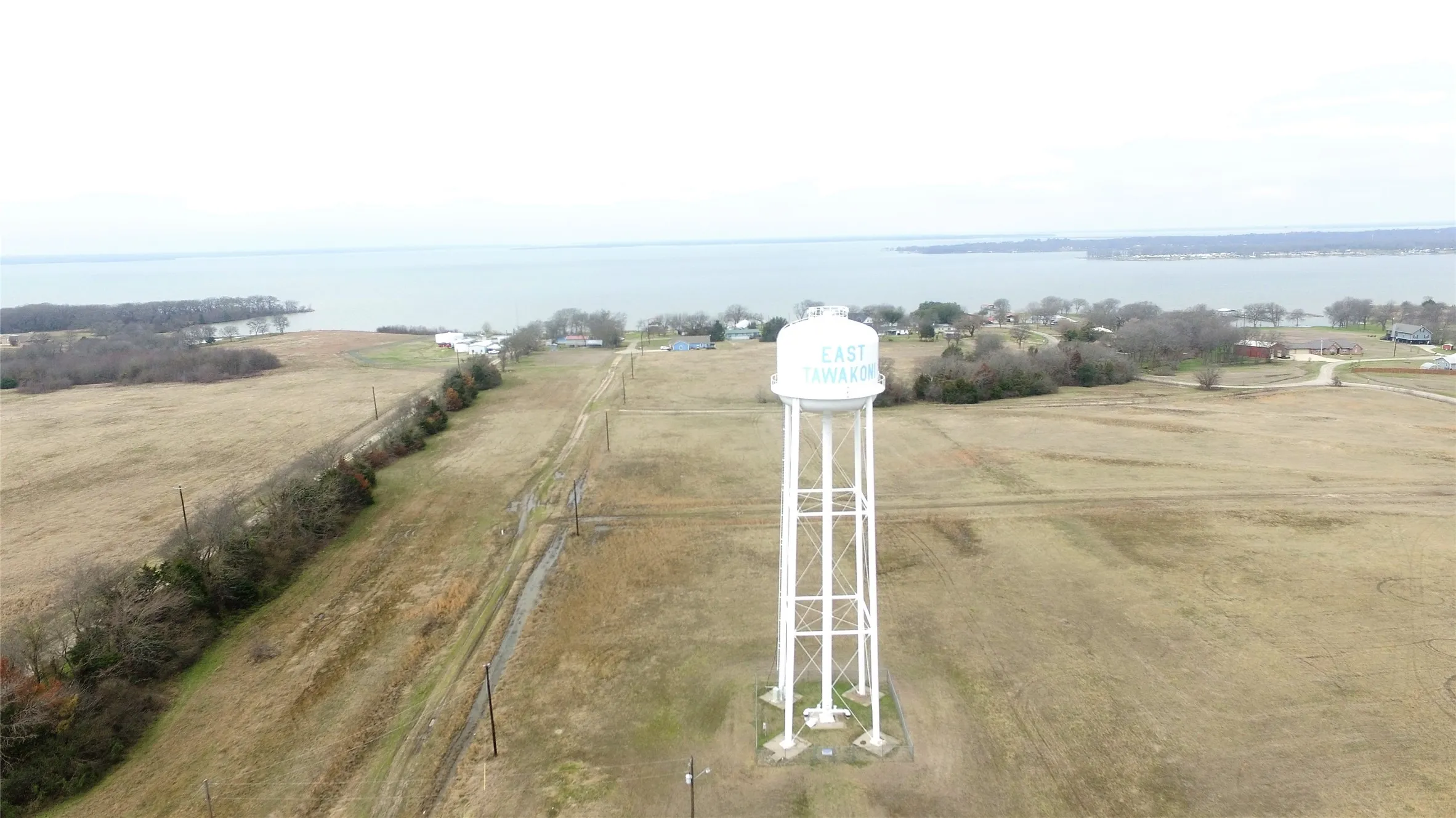 Bird's eye view with a water view and a rural view
