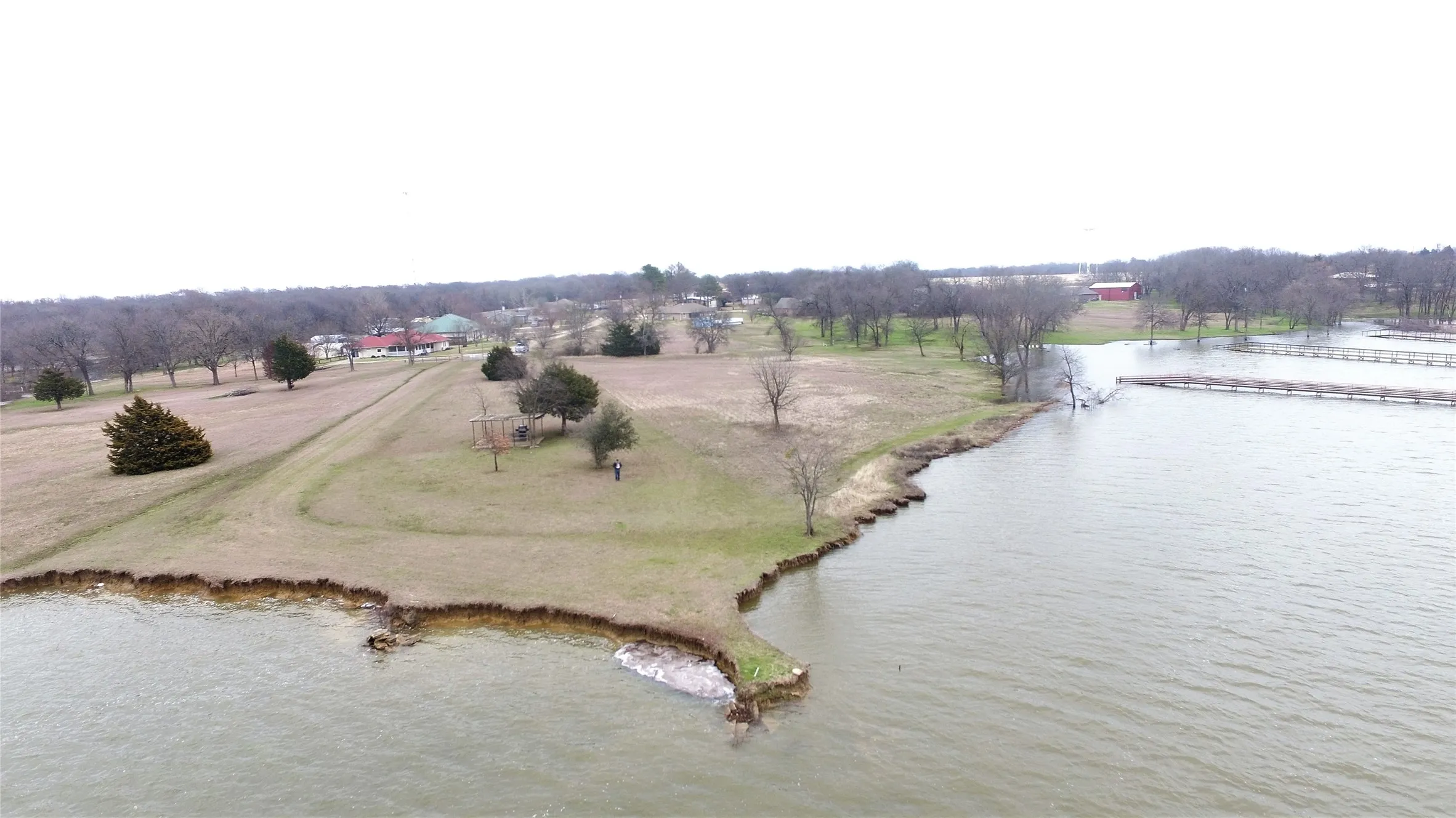 Aerial view featuring a water view and a rural view
