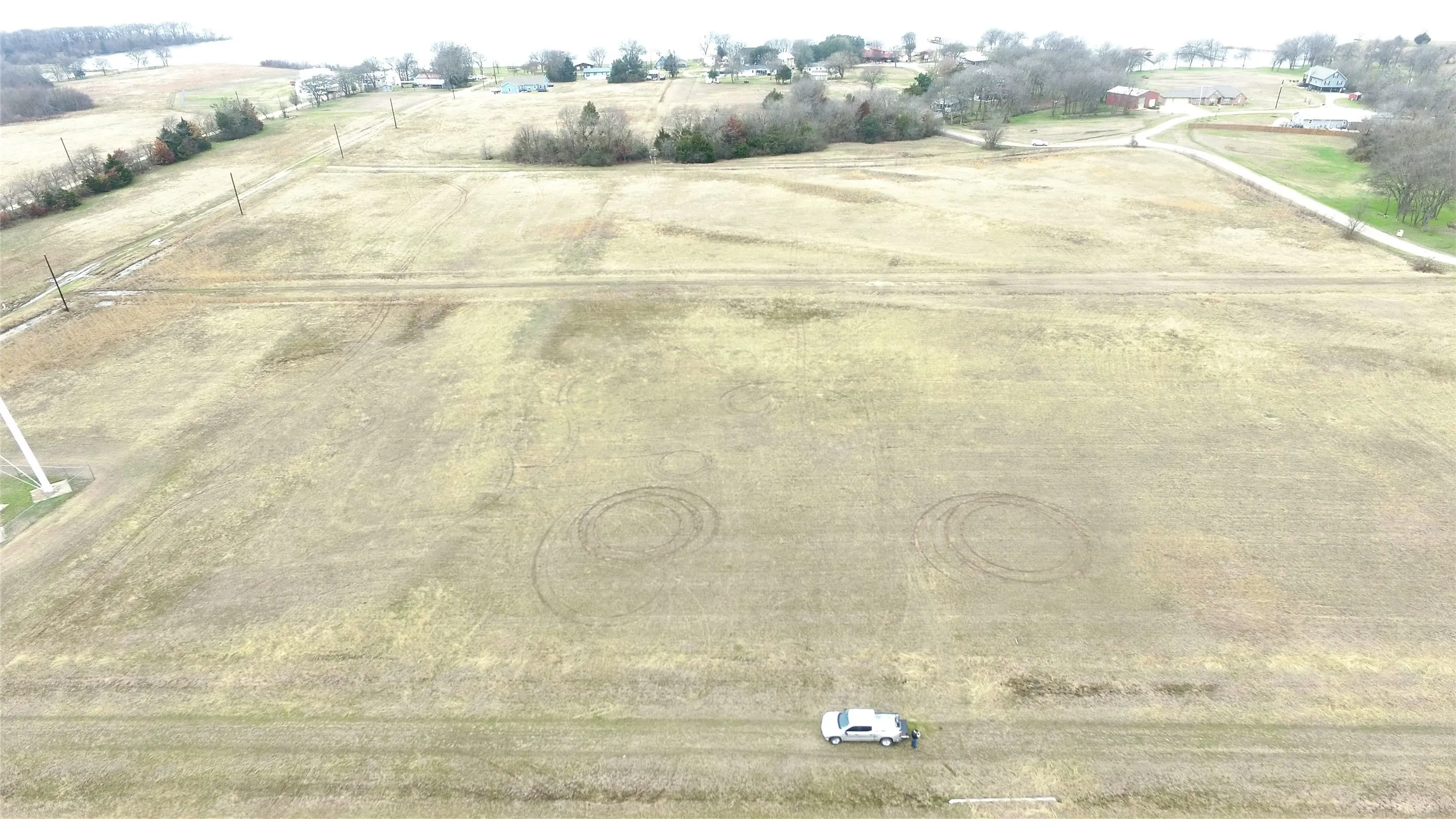 Birds eye view of property featuring a rural view