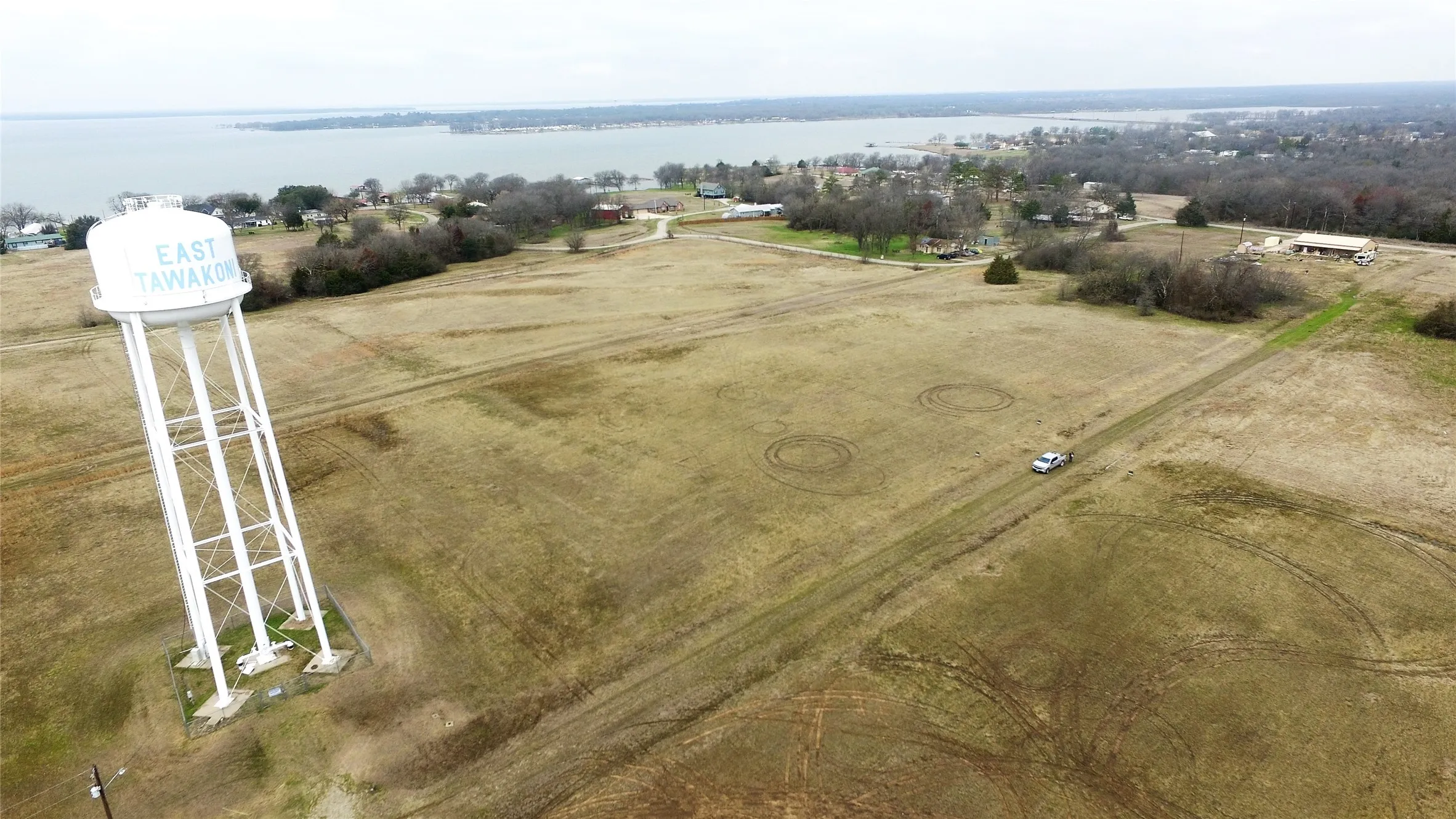 Birds eye view of property featuring a rural view and a water view