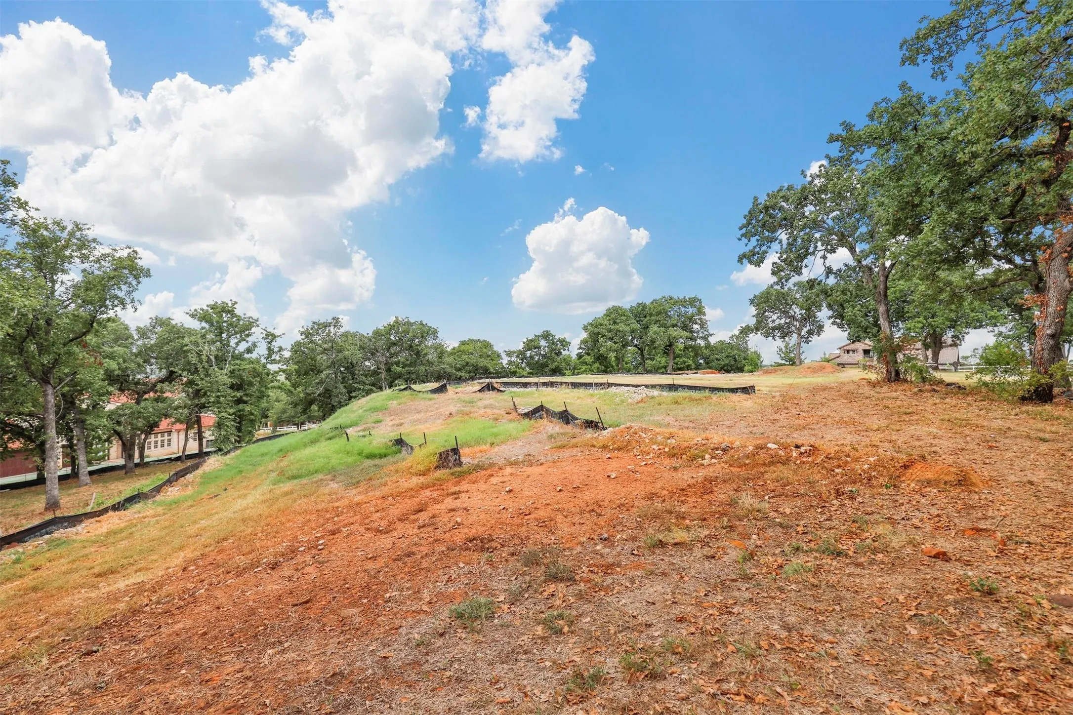 View of yard with a rural view