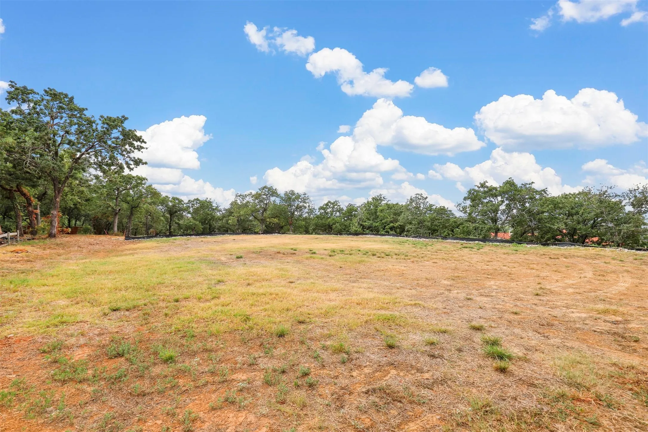 View of yard with a rural view