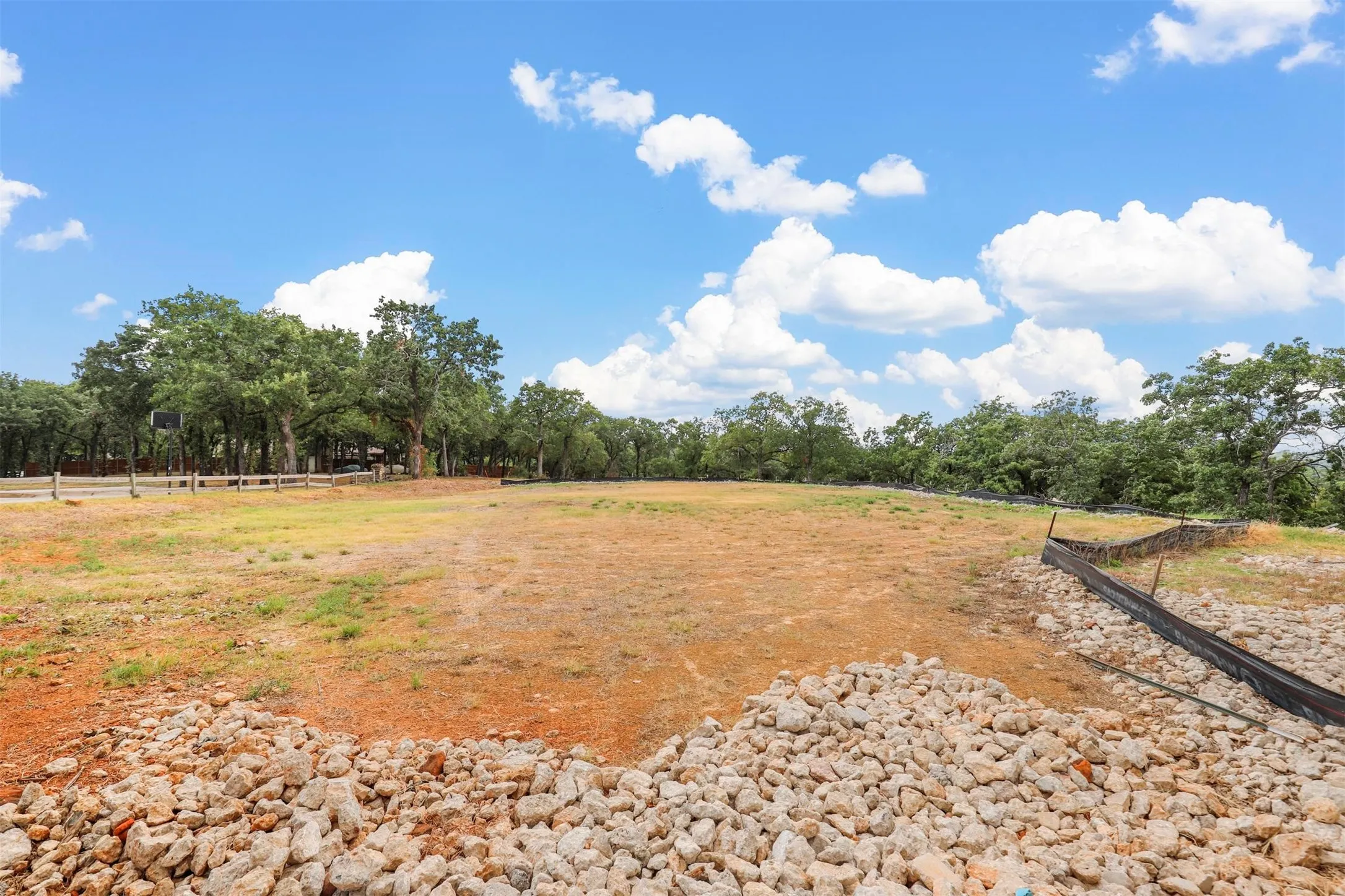 View of yard with a rural view