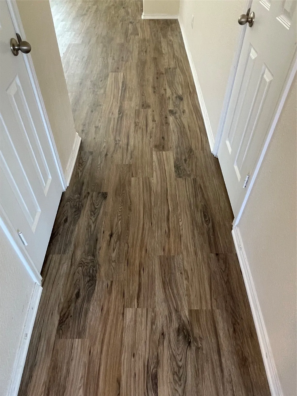 Room details with hardwood / wood-style flooring