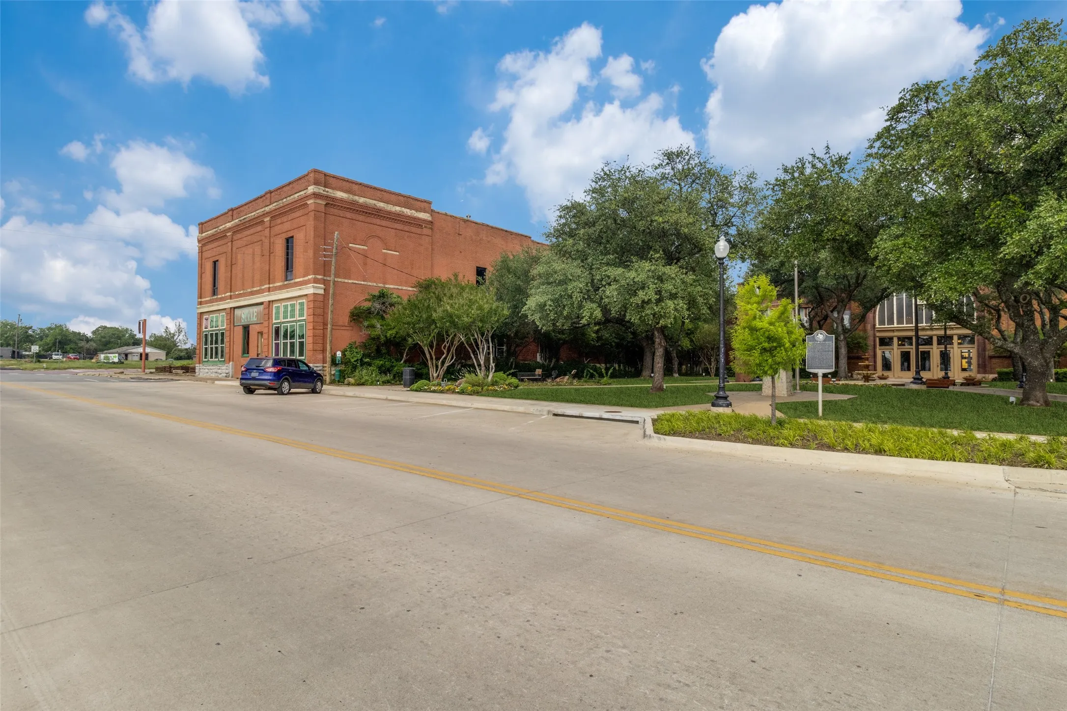 View from the west of building with Katy Depot park on west side of building.